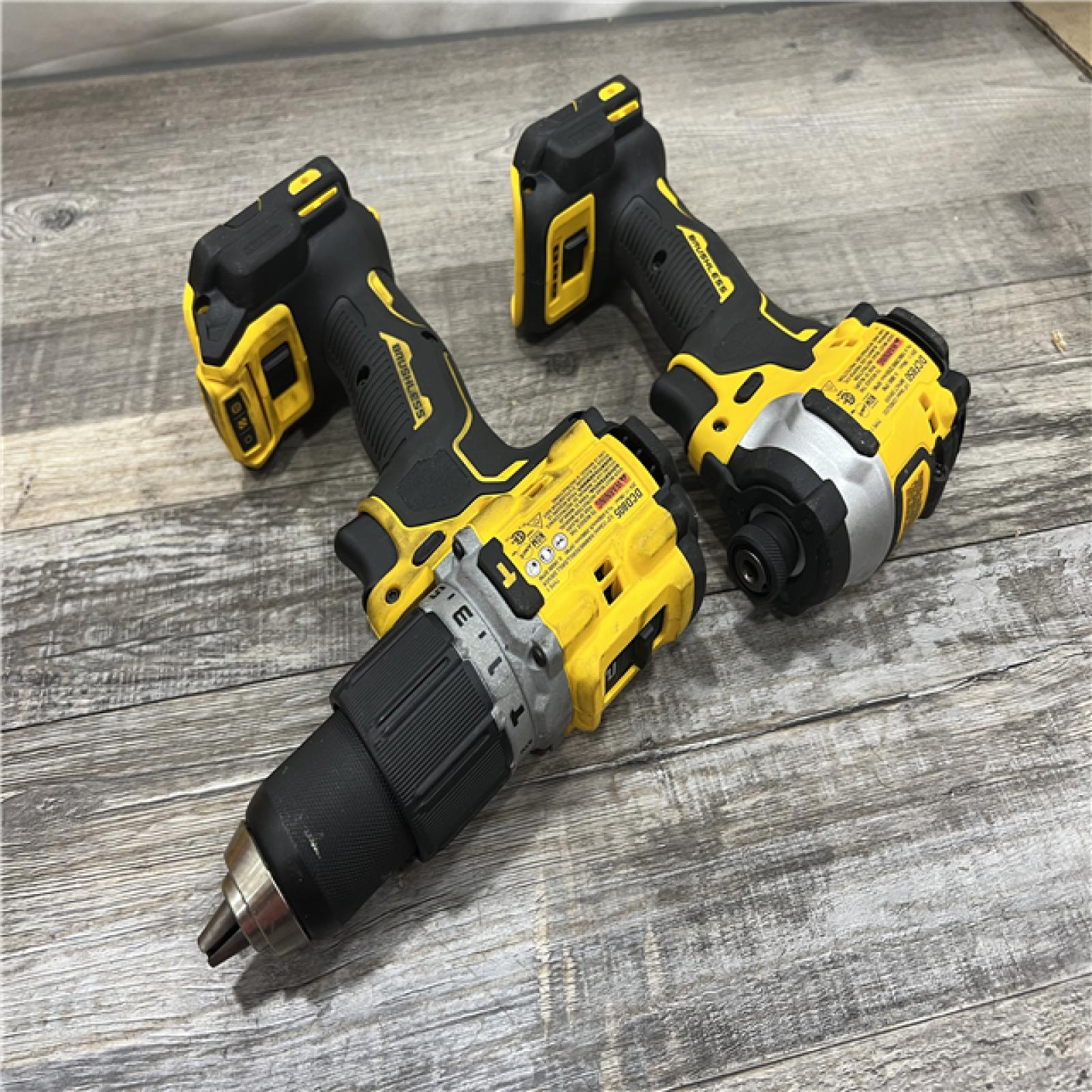 AS-IS DEWALT 20V MAX XR Hammer Drill and ATOMIC Impact Driver 2 Tool Cordless Combo Kit with (2) 4.0Ah Batteries, Charger, and Bag