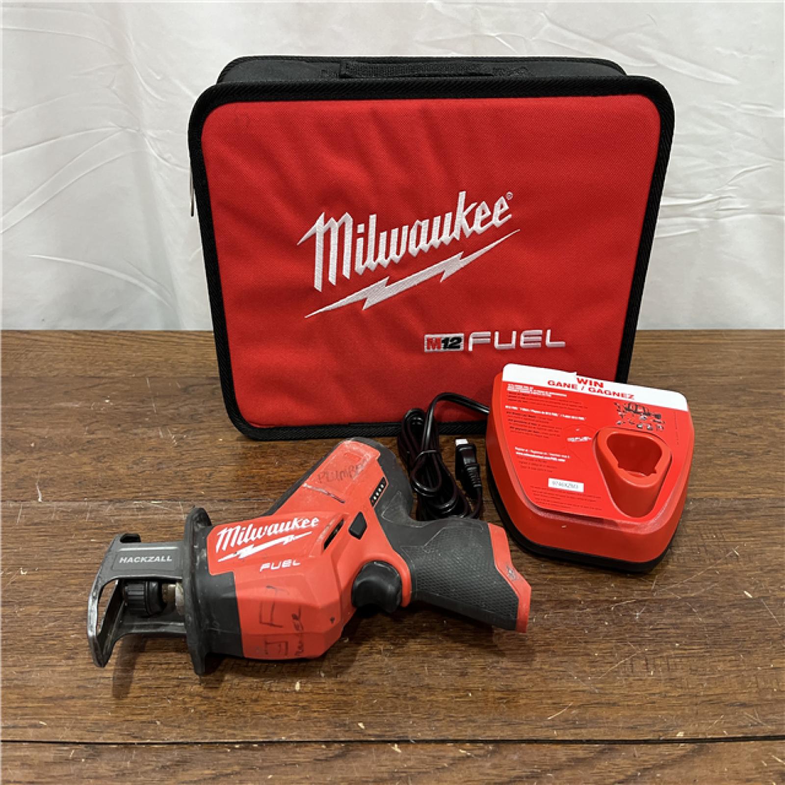 AS-IS Milwaukee M12 FUEL 12-Volt Lithium-Ion Brushless Cordless HACKZALL Reciprocating Saw Kit W/ Free M12 2.0Ah Compact Battery