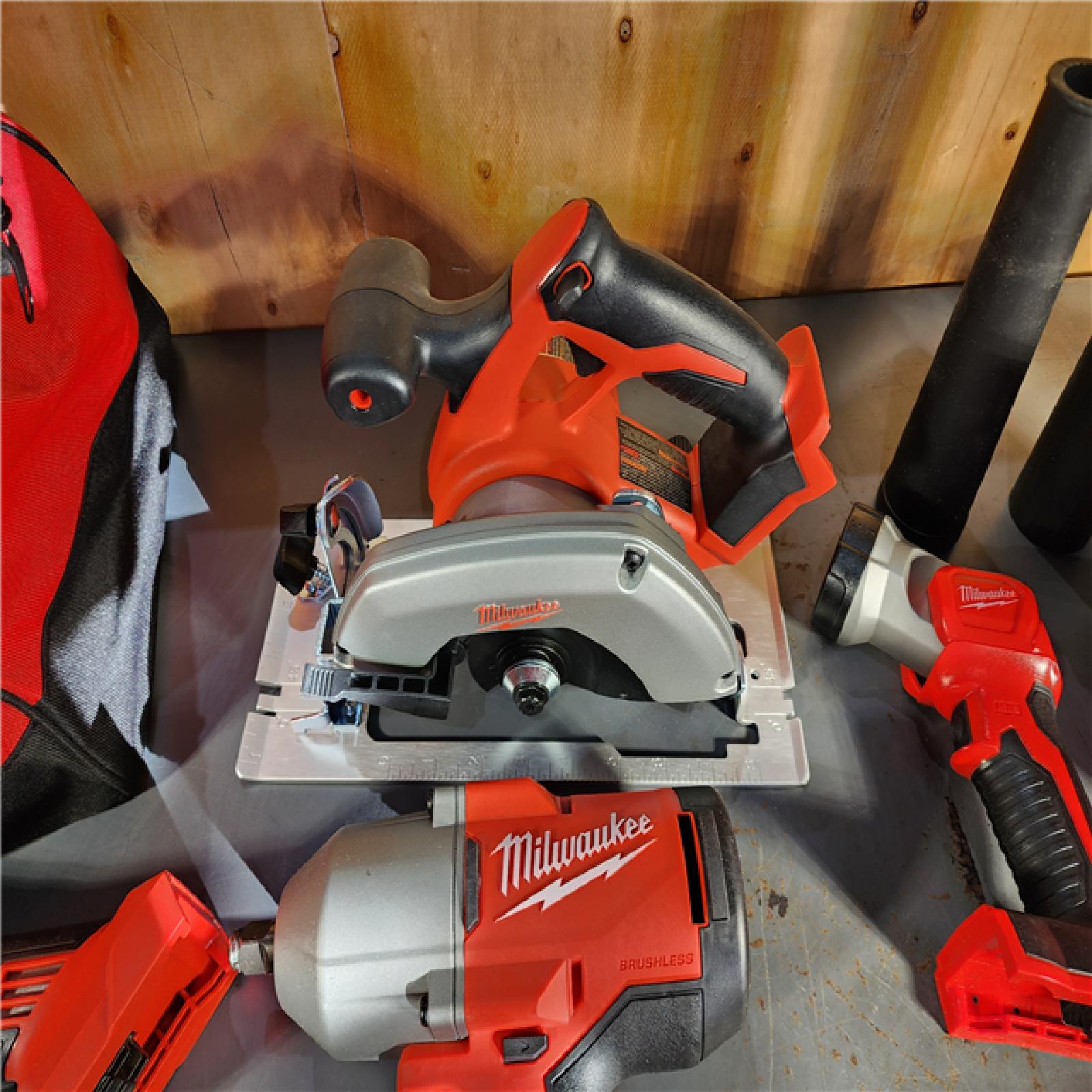 HOUSTON LOCATION - AS-IS (APPEARS LIKE NEW) Milwaukee M18 18-Volt Lithium-Ion Cordless Combo Kit (9-Tool) with (2) Batteries, Charger, and Tool Bag