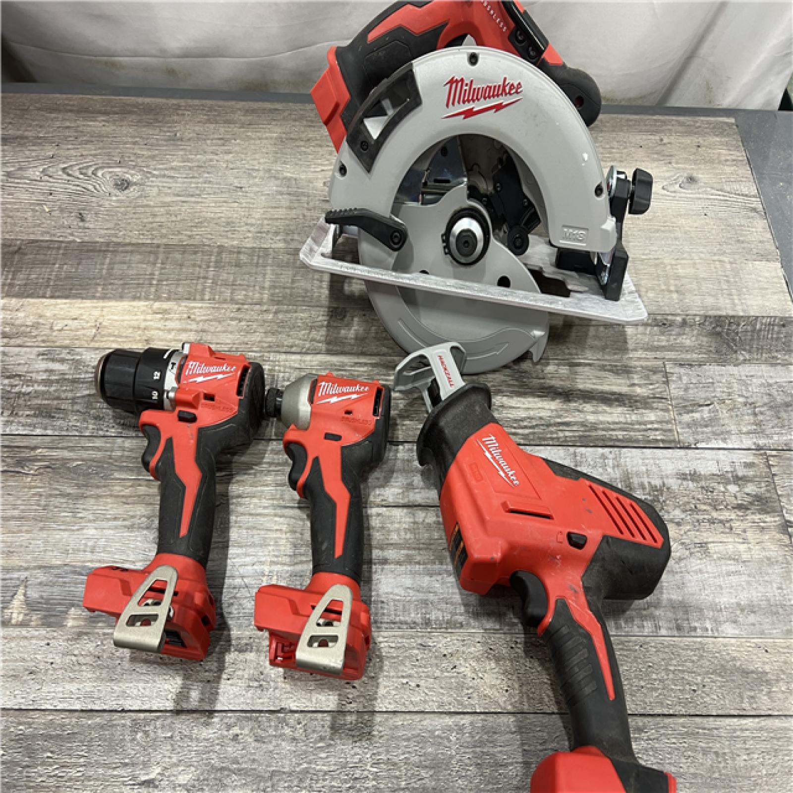 AS-IS Milwaukee M18 18-Volt Lithium-Ion Brushless Cordless Combo Kit (4-Tool) with 2-Batteries, 1-Charger and Tool Bag