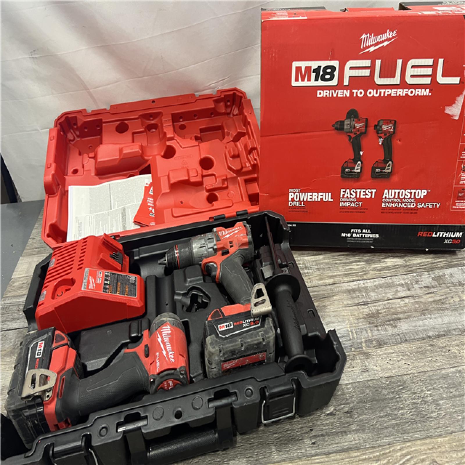 AS-IS MILWAUKEE M18 FUEL 18V Lithium-Ion Brushless Cordless Hammer Drill and Impact Driver Combo Kit (2-Tool) with 2 Batteries