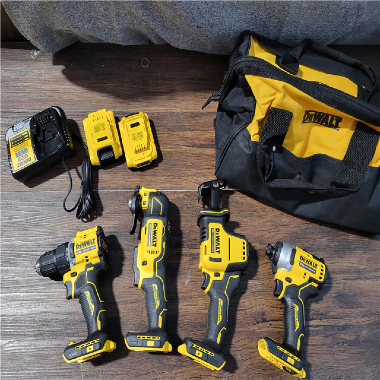 CALIFORNIA NEW DEWALT ATOMIC BRUSHLESS 4-TOOL COMBO KIT (2 BATTERIES,1 CHARGER, AND BAG INCUDED)