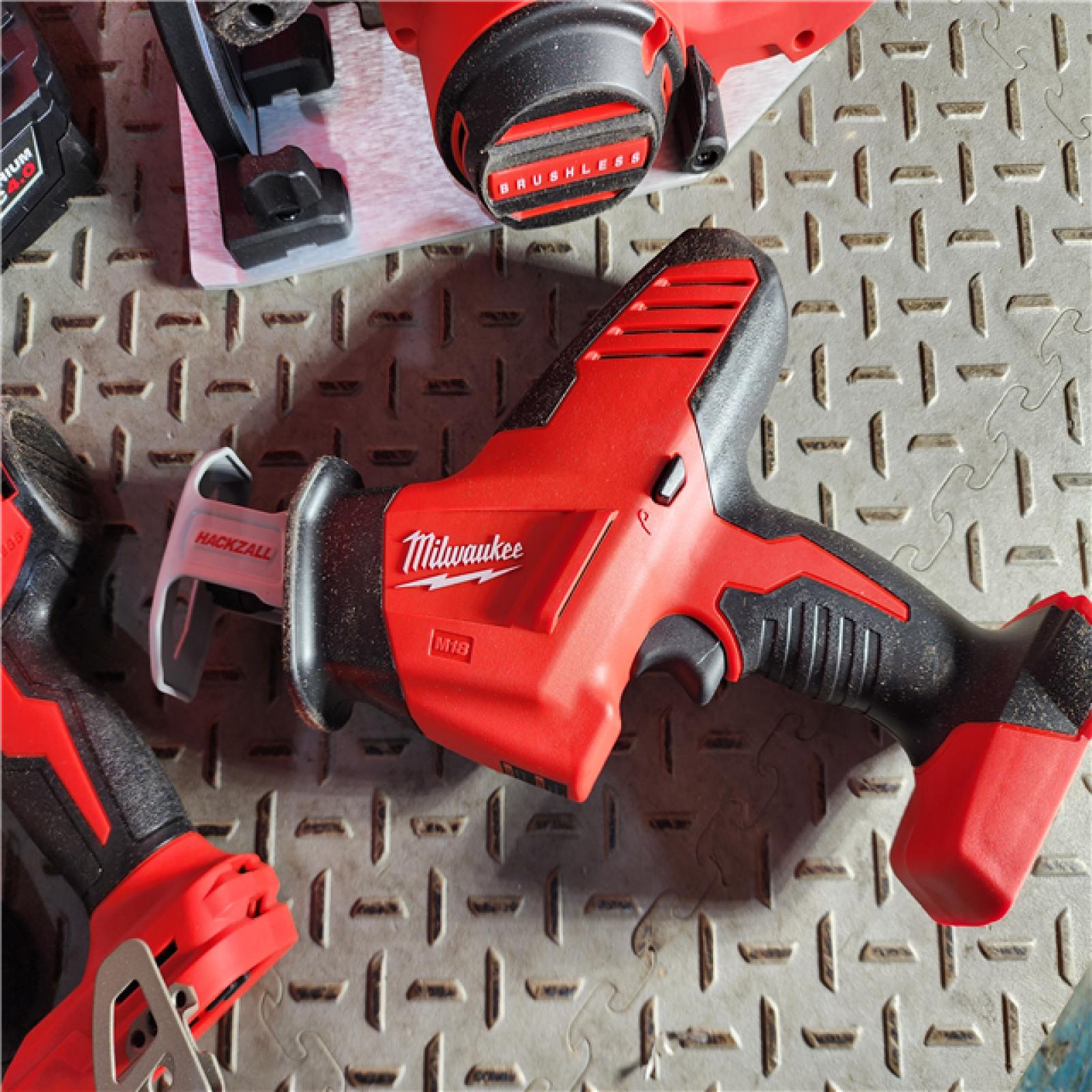 HOUSTON LOCATION - AS-IS (APPEARS LIKE NEW) Milwaukee M18 18-Volt Lithium-Ion Brushless Cordless Combo Kit (4-Tool) with 2-Batteries, 1-Charger and Tool Bag