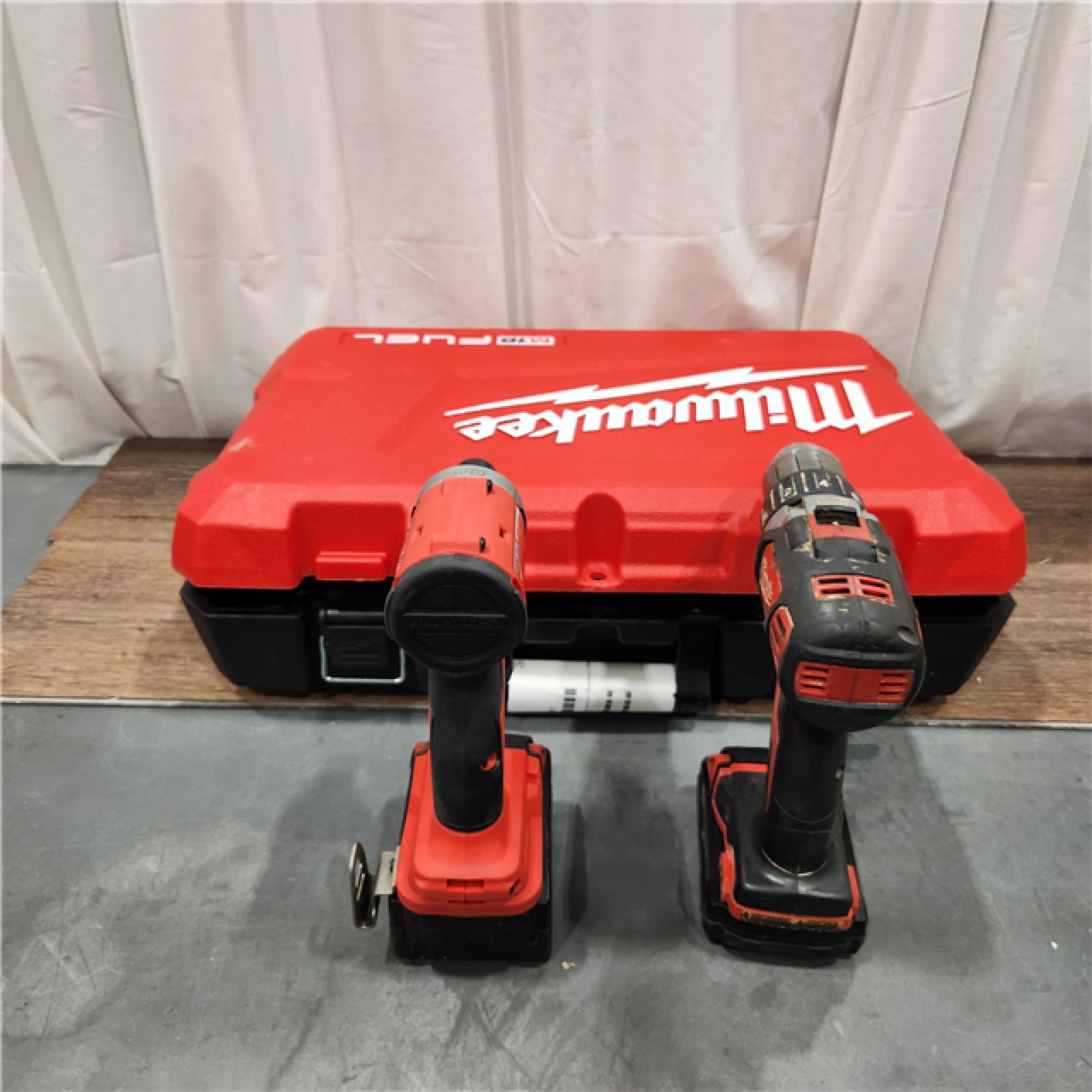 AS IS Milwaukee M18 FUEL 18V Lithium-Ion Brushless Cordless Hammer Drill and Impact Driver Combo Kit (2-Tool) with 2 Batteries