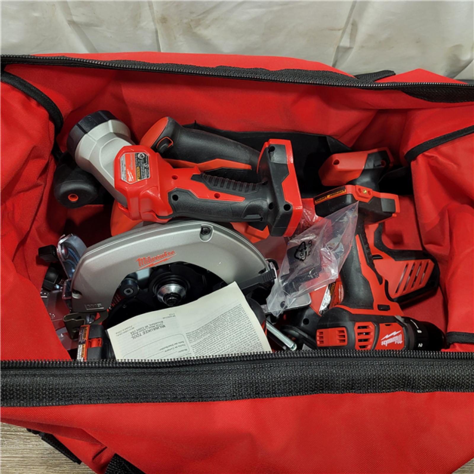 AS-IS Milwaukee M18 18-Volt Lithium-Ion Cordless Combo Tool Kit (5-Tool) with (1) 3.0Ah and (1) 1.5Ah Battery, (1) Charger, (1) Tool Bag