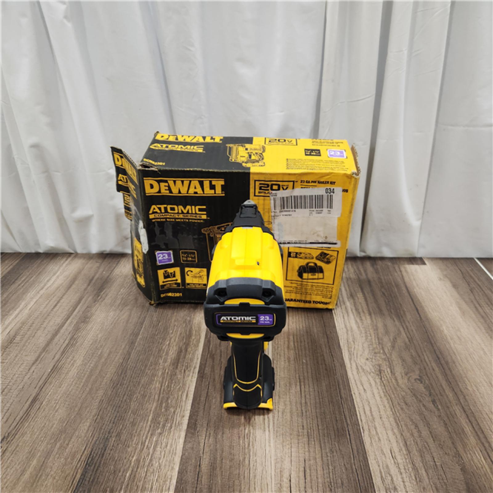 AS IS DEWALT ATOMIC 20V MAX Lithium Ion Cordless 23 Gauge Pin Nailer Kit with 3.0Ah Battery and Charger