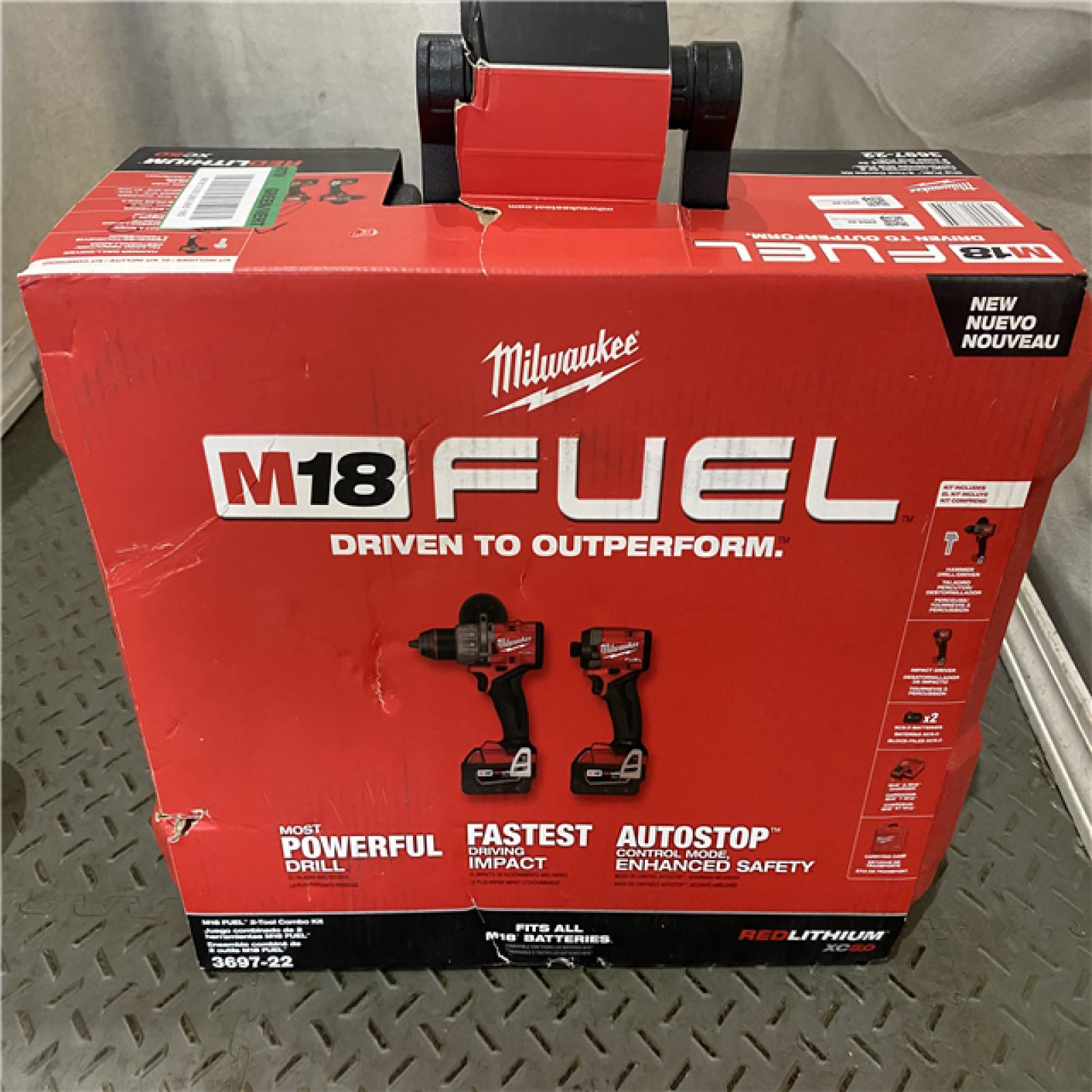 Houston location AS-IS MILWAUKEE M18 FUEL 18V Lithium-Ion Brushless Cordless Hammer Drill and Impact Driver Combo Kit (2-Tool) ONLY CHARGER