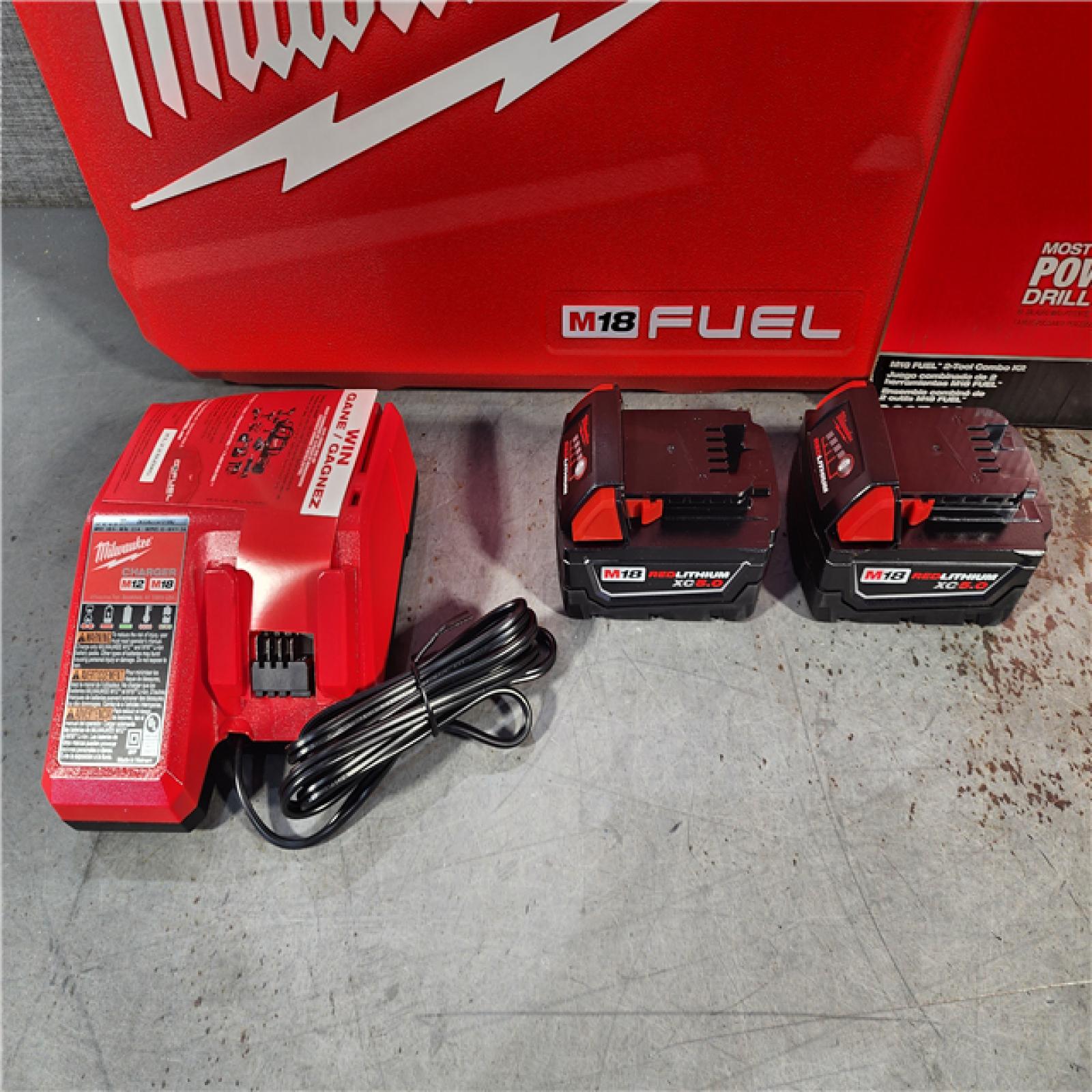 HOUSTON LOCATION - AS-IS (APPEARS LIKE NEW) Milwaukee M18 FUEL 18V Lithium-Ion Brushless Cordless Hammer Drill and Impact Driver Combo Kit (2-Tool) with 2 Batteries