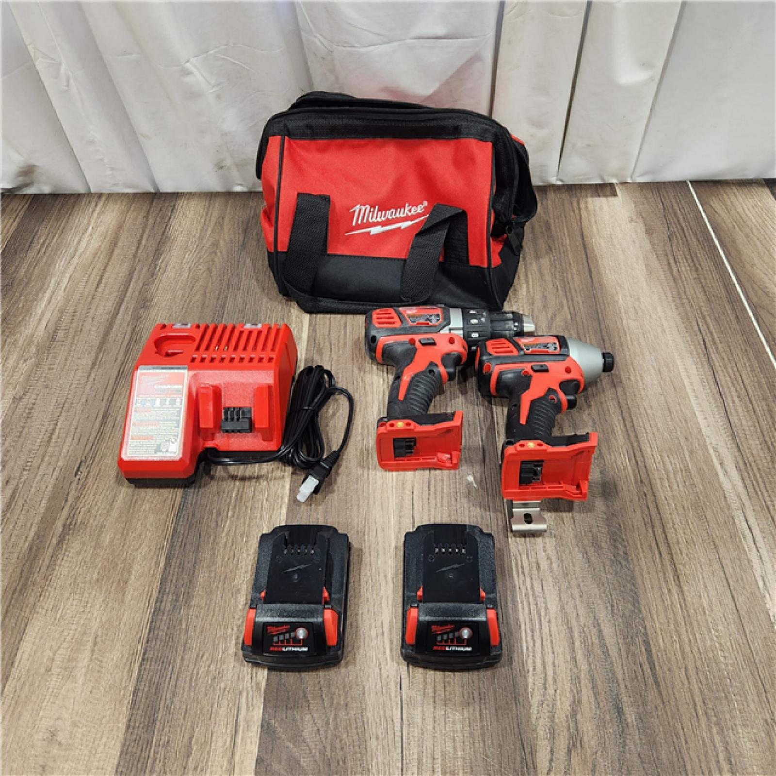 AS IS Milwaukee M18 18V Cordless Brushed 2 Tool Drill/Driver and Impact Driver Kit