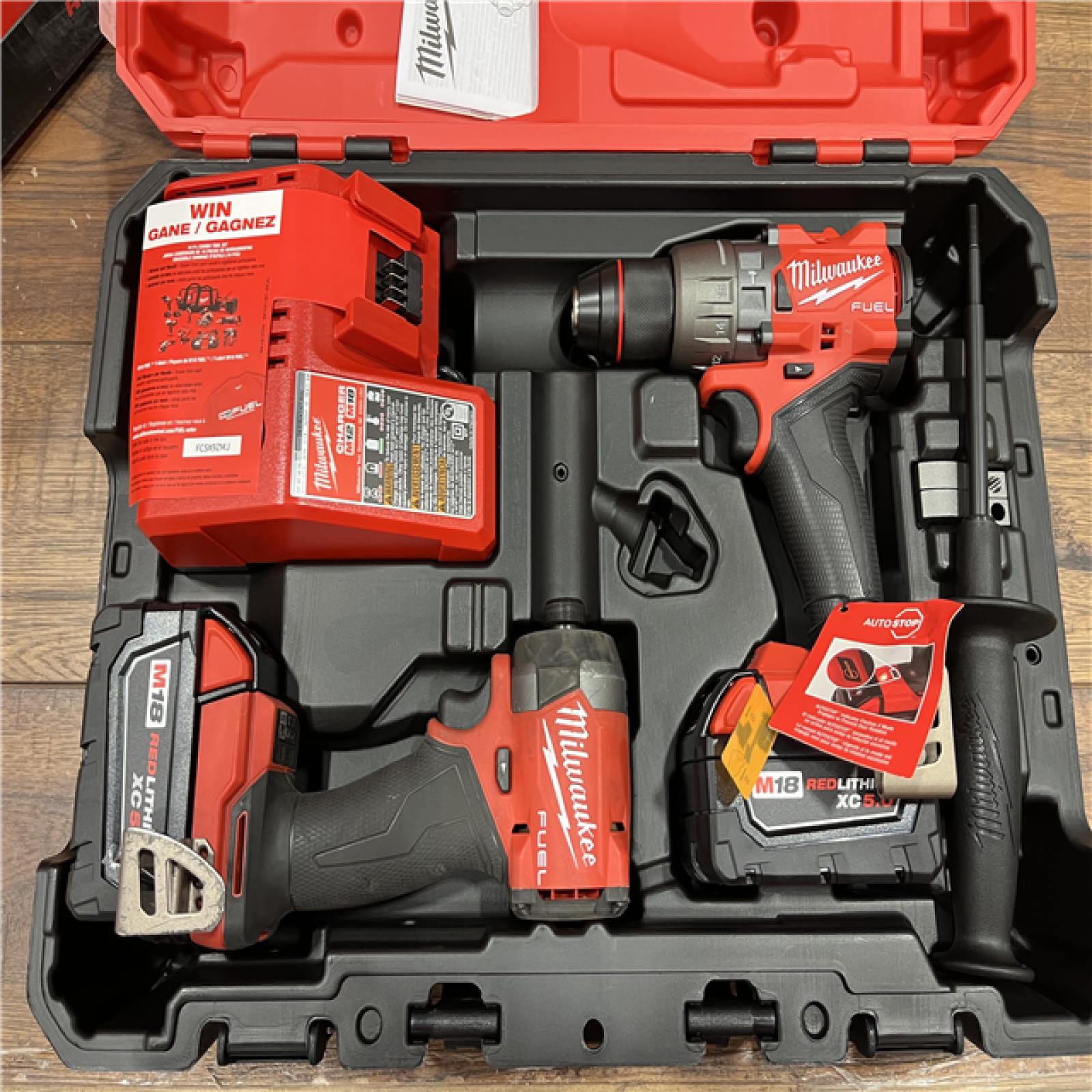 AS-IS Milwaukee M18 FUEL 18V Lithium-Ion Brushless Cordless Hammer Drill and Impact Driver Combo Kit (2-Tool) with 2 Batteries