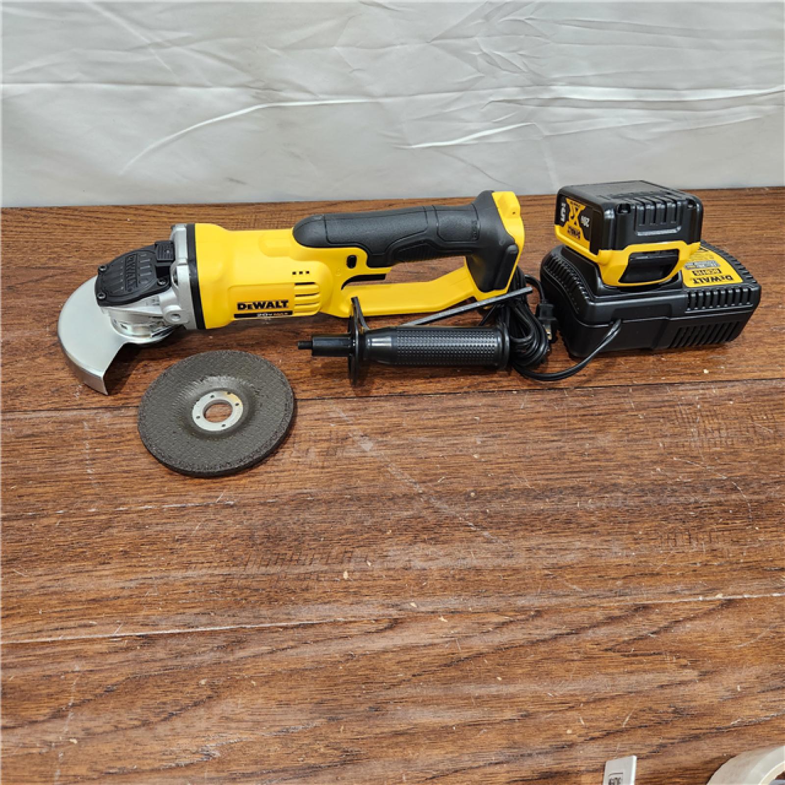 AS-IS 20V MAX Cordless 4.5 in. - 5 in. Grinder, (1) 20V 5.0Ah Battery, and Charger