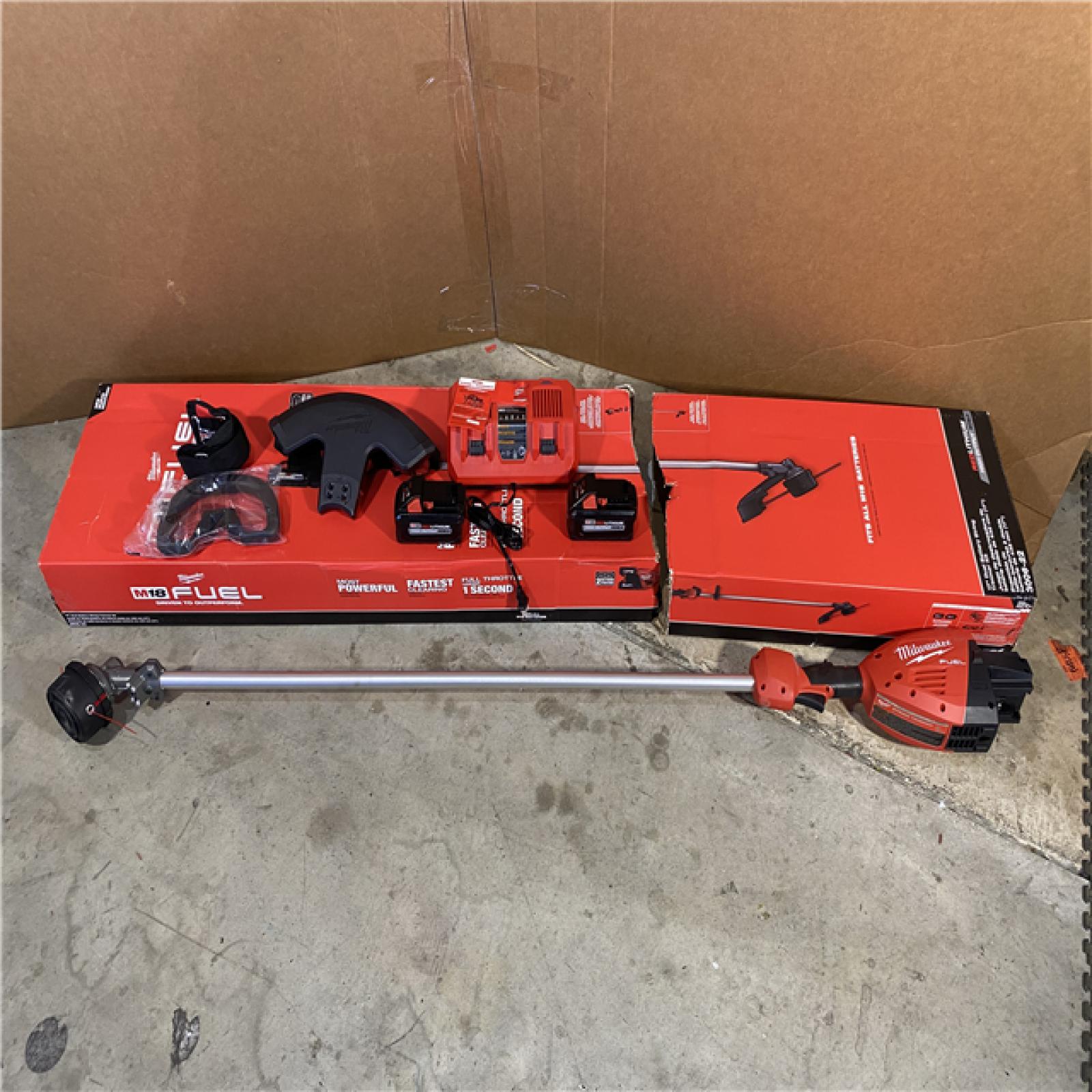 HOUSTON LOCATION - AS-IS M18 FUEL 18V Brushless Cordless 17 in. Dual Battery Straight Shaft String Trimmer with (2) 8.0 Ah Batteries and Charger