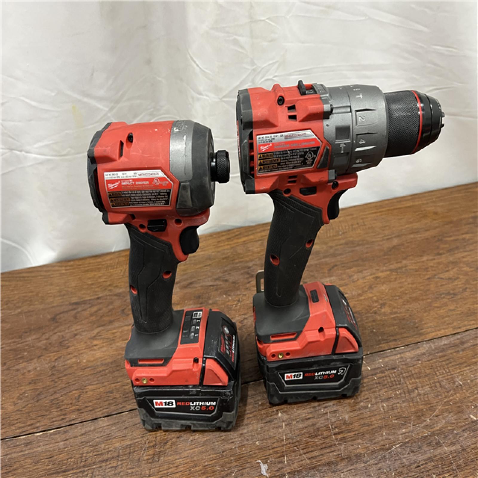 AS-ISMilwaukee M18 FUEL 18V Lithium-Ion Brushless Cordless Hammer Drill and Impact Driver Combo Kit (2-Tool) with 2 Batteries