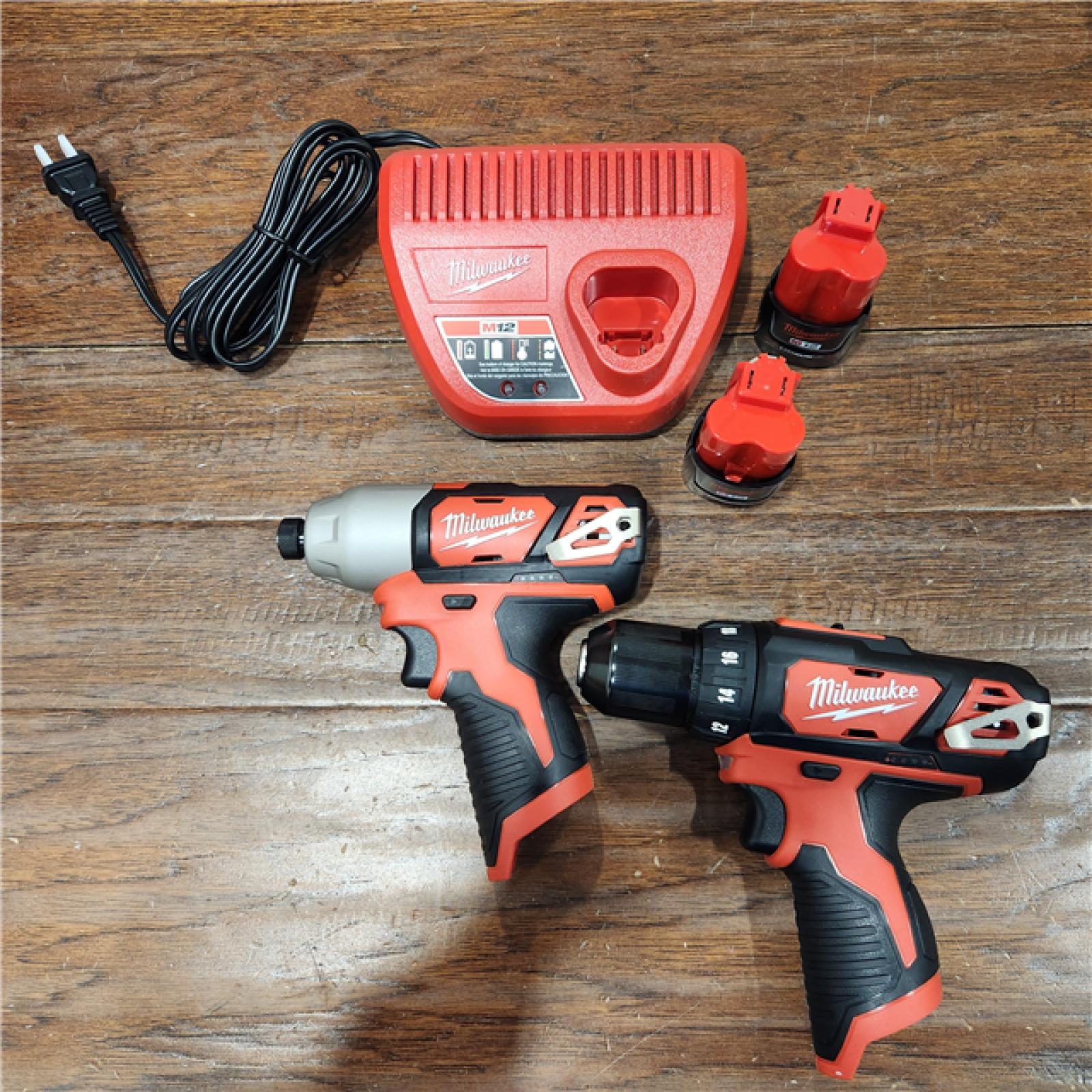 AS-IS M12 12V Lithium-Ion Cordless Drill Driver/Impact Driver Combo Kit with Two 1.5Ah Batteries, Charger and Bag (2-Tool)