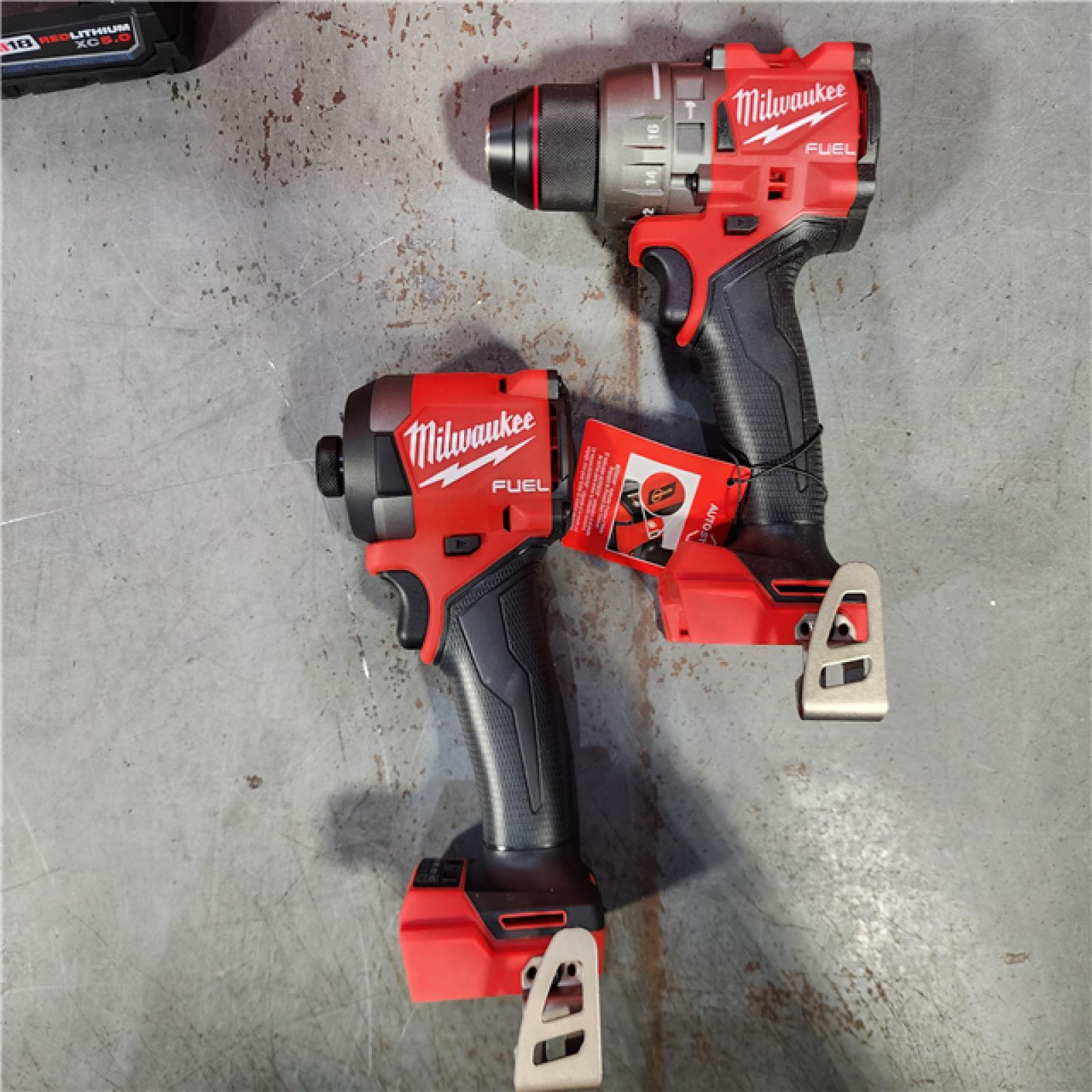 HOUSTON LOCATION - AS-IS (APPEARS LIKE NEW) Milwaukee M18 FUEL 18V Lithium-Ion Brushless Cordless Hammer Drill and Impact Driver Combo Kit (2-Tool) with 2 Batteries