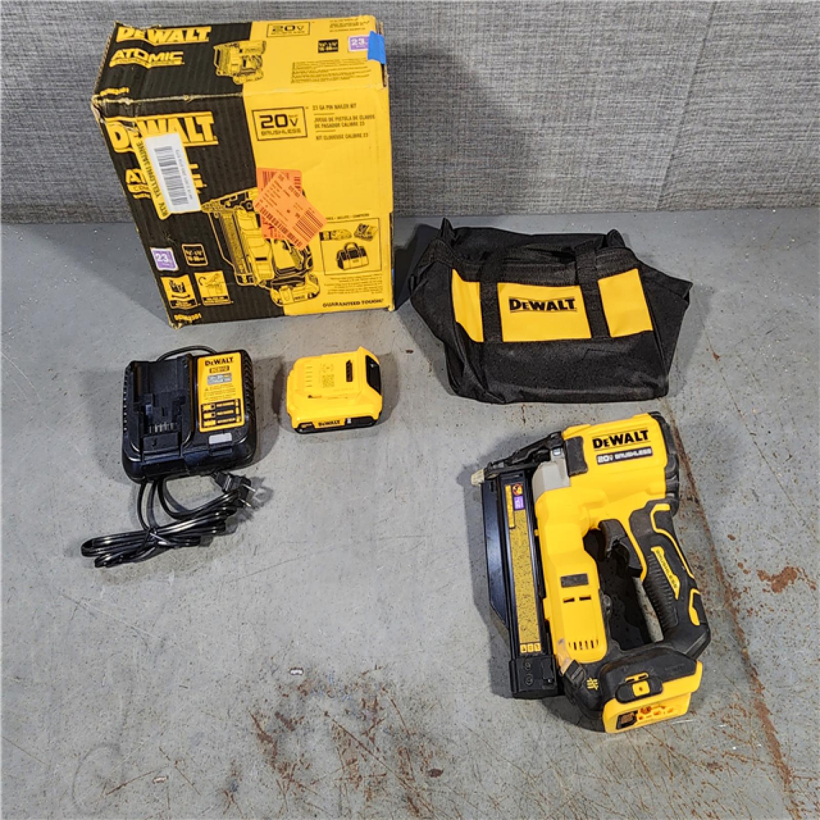 HOUSTON LOCATION - AS-IS DEWALT ATOMIC 20V MAX Lithium Ion Cordless 23 Gauge Pin Nailer Kit with 2.0Ah Battery and Charger