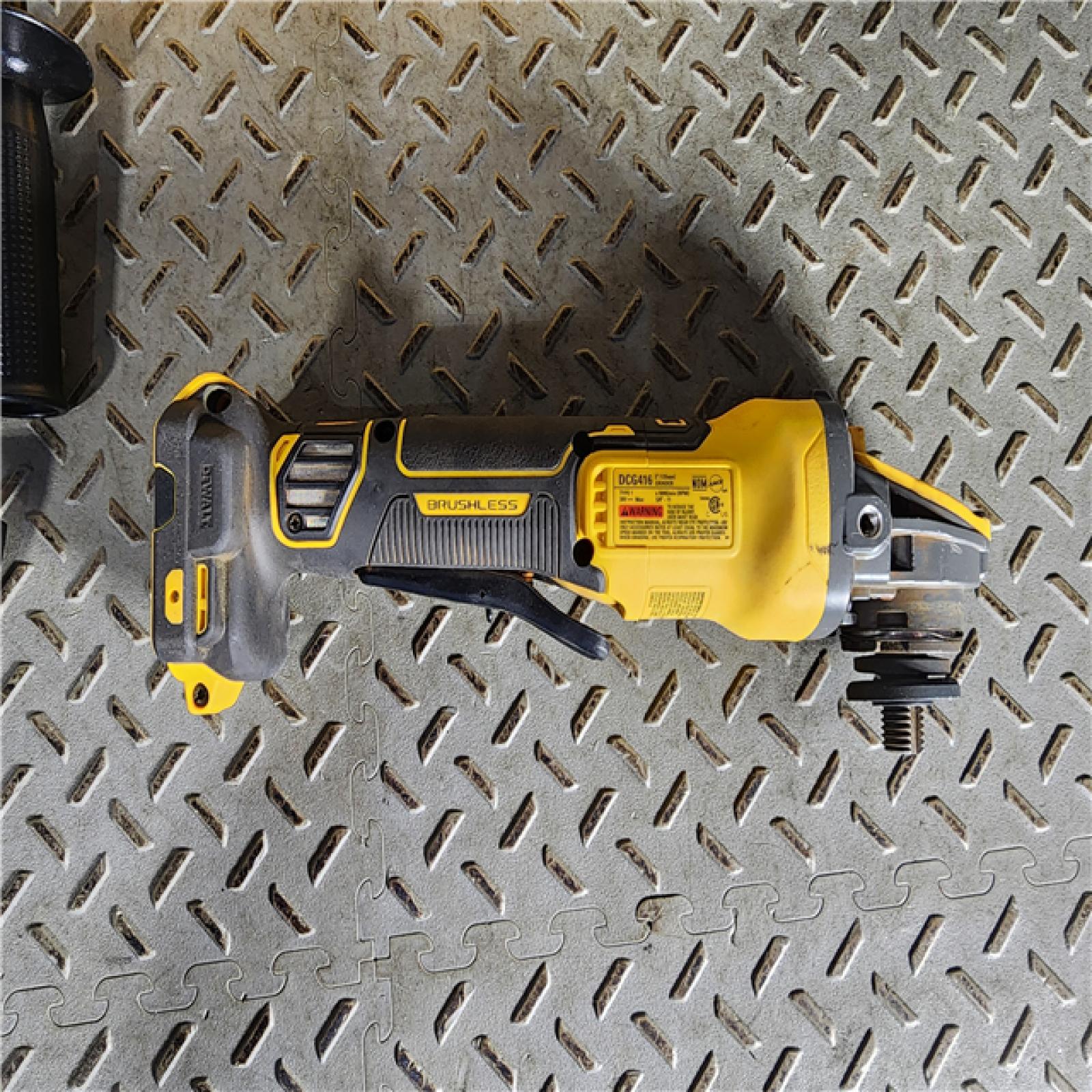 HOUSTON LOCATION - AS-IS 20V MAX Cordless Brushless 4.5 - 5 in. Paddle Switch Angle Grinder with FLEXVOLT ADVANTAGE (Tool Only)