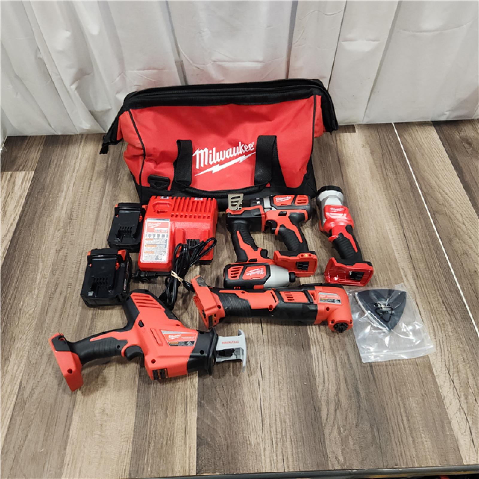 AS IS M18 18V Lithium-Ion Cordless Combo Kit (5-Tool) with (2) Batteries, Charger and Tool Bag