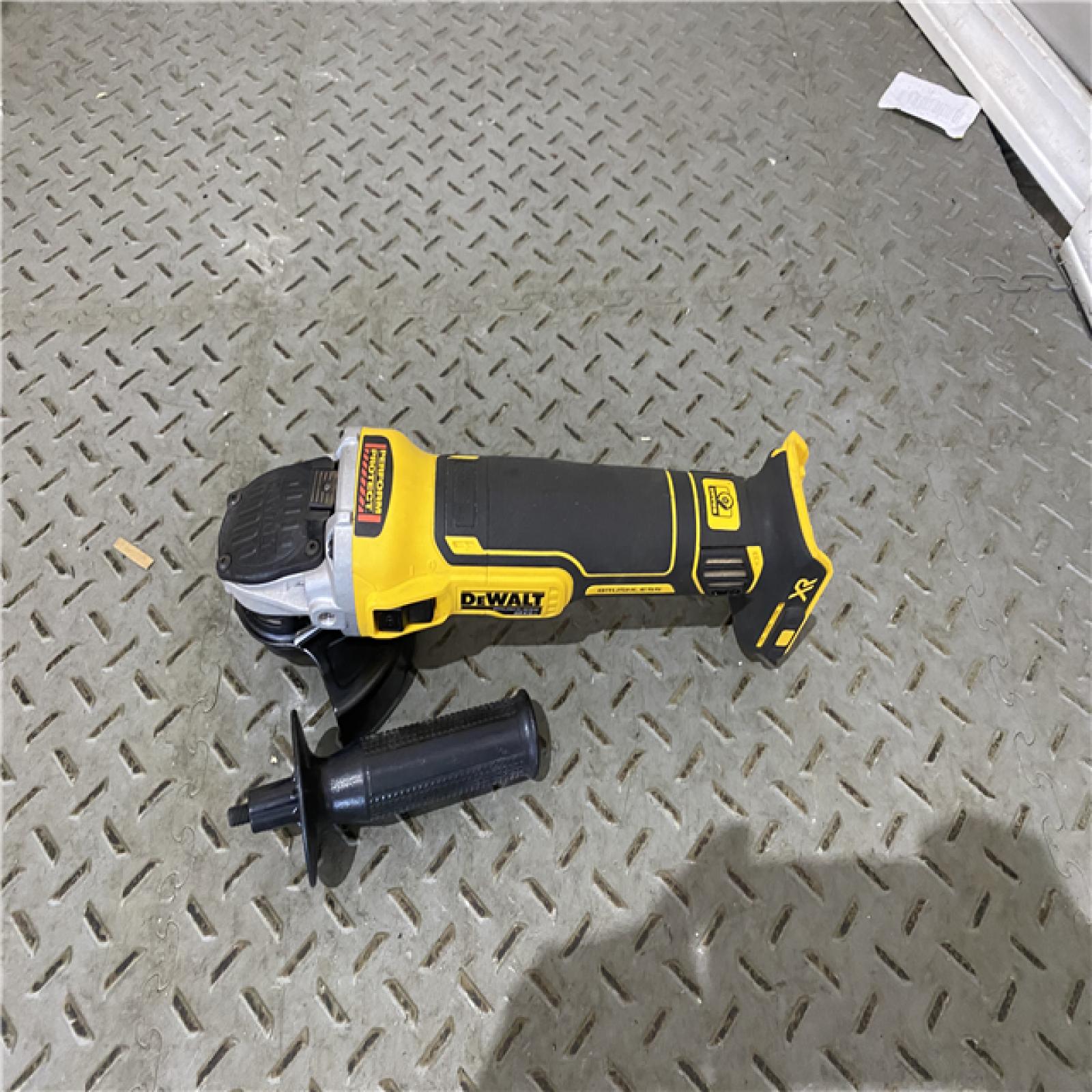 Houston location AS-IS DeWalt DCG405B 20V Max XR 4.5-Inch Slide Switch Small Angle Grinder (Tool Only)