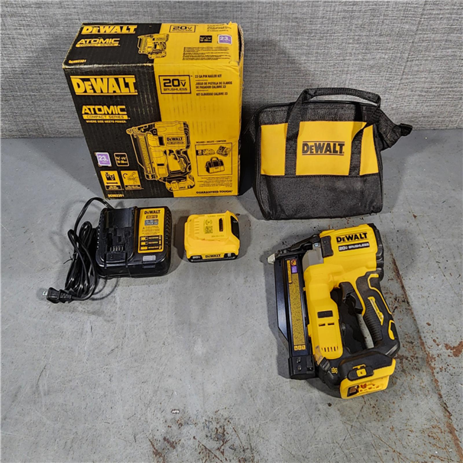 HOUSTON LOCATION - AS-IS DEWALT ATOMIC 20V MAX Lithium Ion Cordless 23 Gauge Pin Nailer Kit with 2.0Ah Battery and Charger