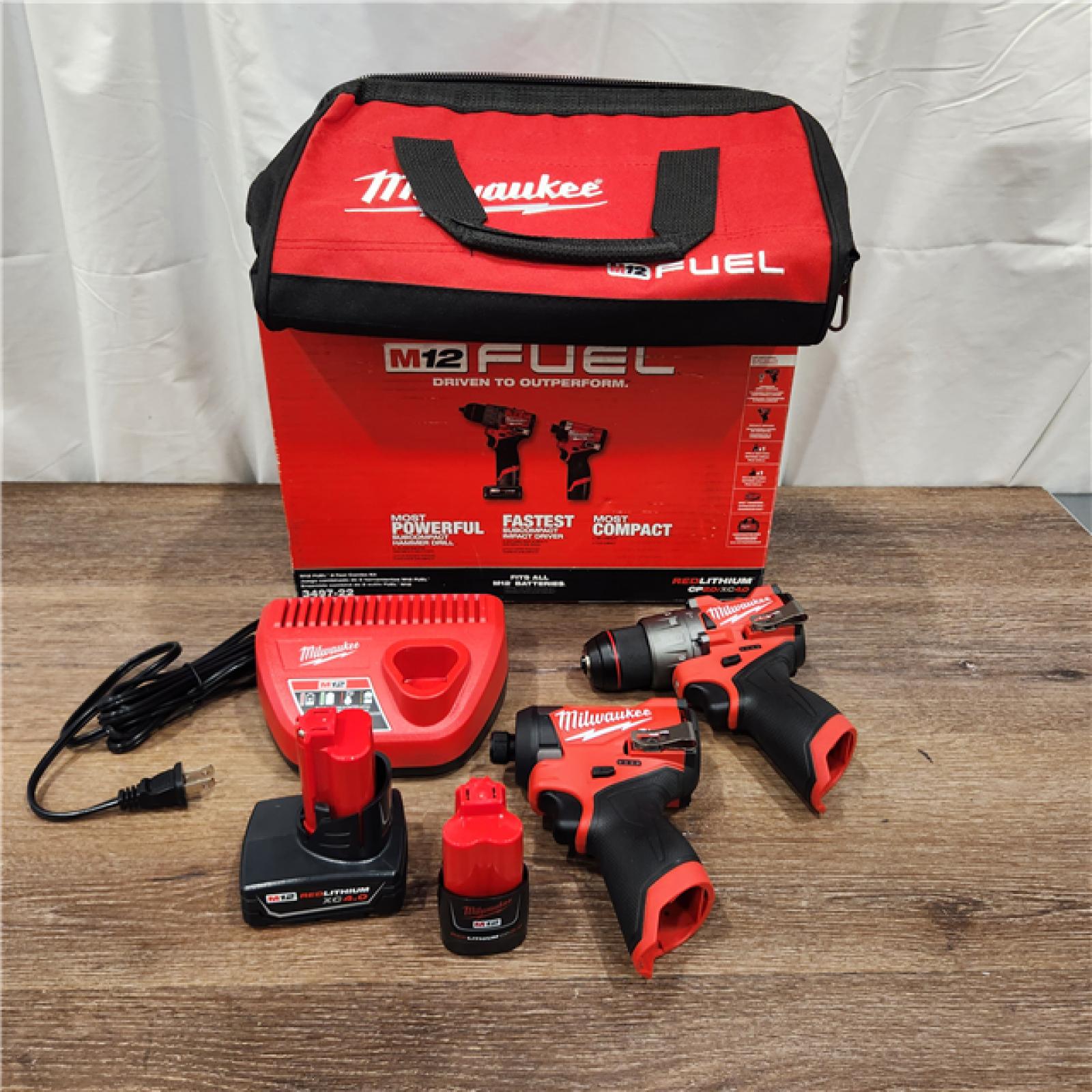 AS-IS M12 FUEL 12-Volt Lithium-Ion Brushless Cordless Hammer Drill and Impact Driver Combo Kit W/2 Batteries and Bag (2-Tool)