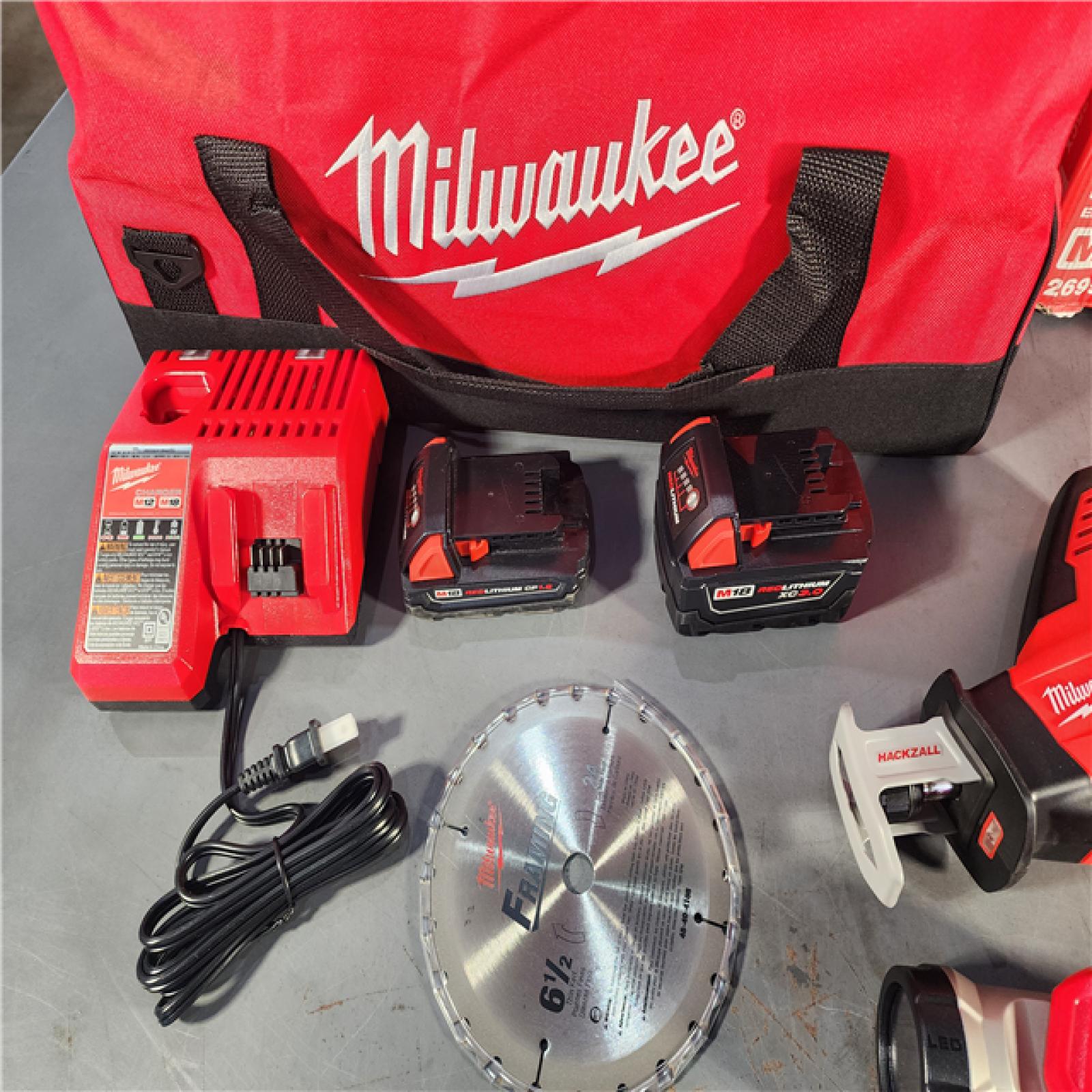 HOUSTON LOCATION - AS-IS (APPEARS LIKE NEW) Milwaukee M18 18-Volt Lithium-Ion Cordless Combo Tool Kit (5-Tool) with (1) 3.0Ah and (1) 1.5Ah Battery, (1) Charger, (1) Tool Bag