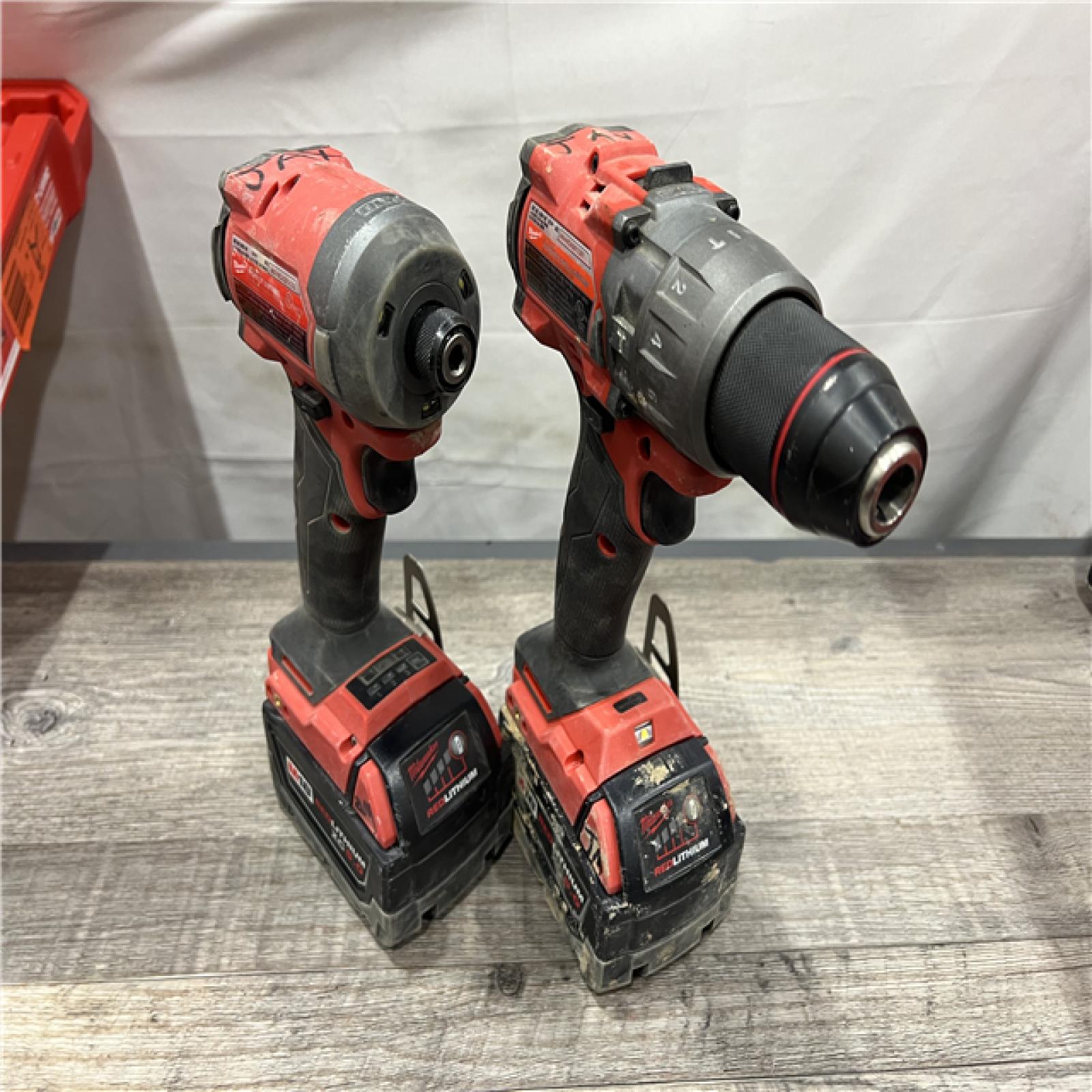 AS-IS Milwaukee M18 FUEL 18V Lithium-Ion Brushless Cordless Hammer Drill and Impact Driver Combo Kit (2-Tool) with 2 Batteries