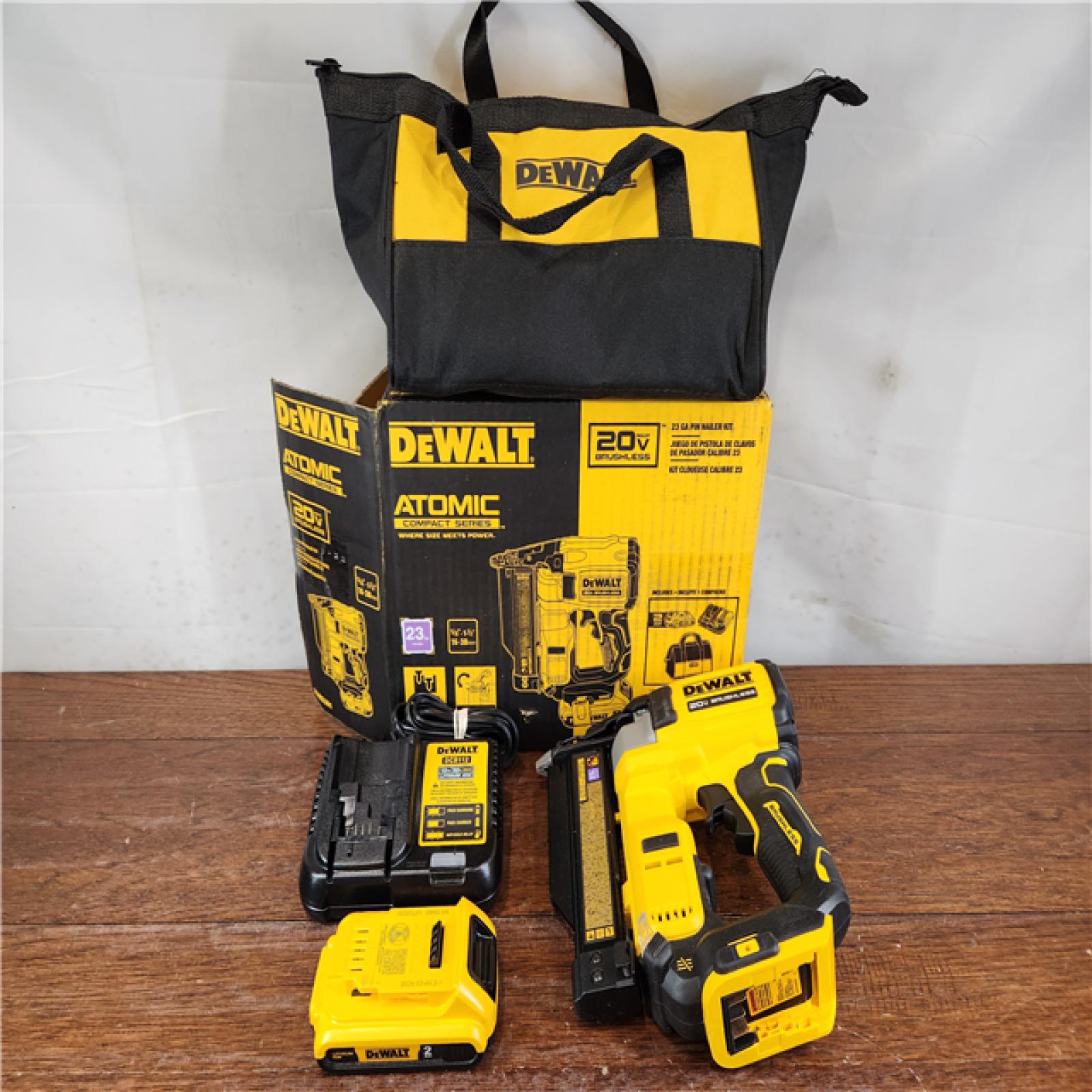 AS-IS DEWALT ATOMIC COMPACT 20V MAX Brushless Cordless 23 Ga. Pin Nailer Kit