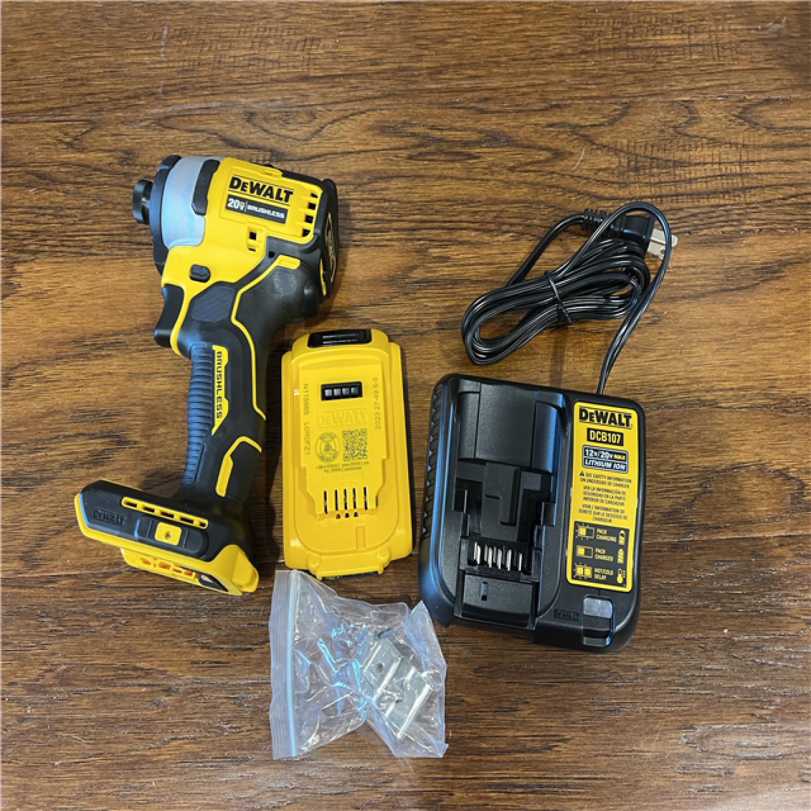 AS-IS DEWALT ATOMIC 20V Max Lithium-Ion Brushless Cordless Compact 1/4 in. Impact Driver Kit with 2.0Ah Battery, Charger and Bag