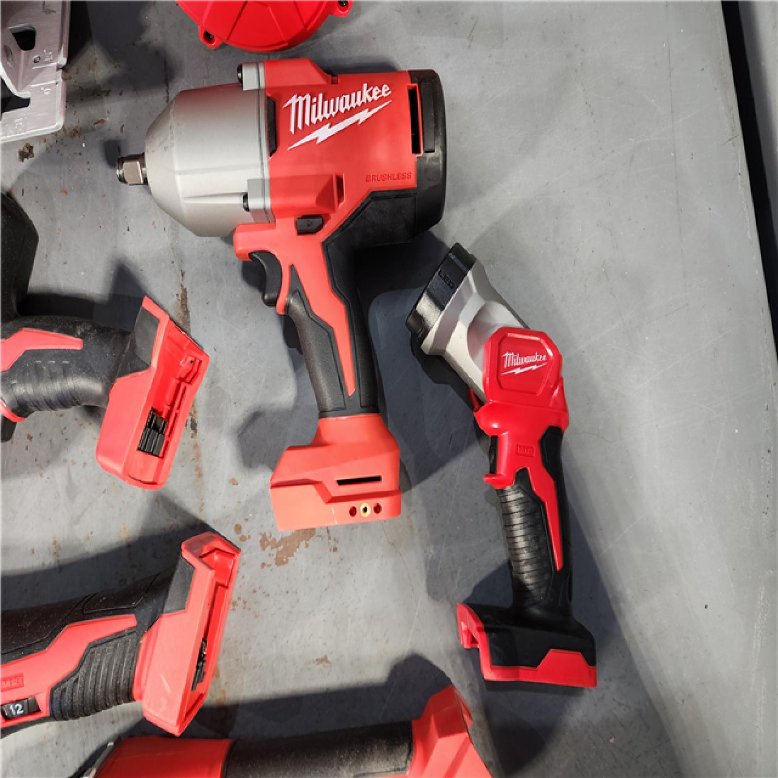 HOUSTON LOCATION - AS-IS M18 18-Volt Lithium-Ion Cordless Combo Kit (9-Tool) with (2) Batteries, Charger, and Tool Bag