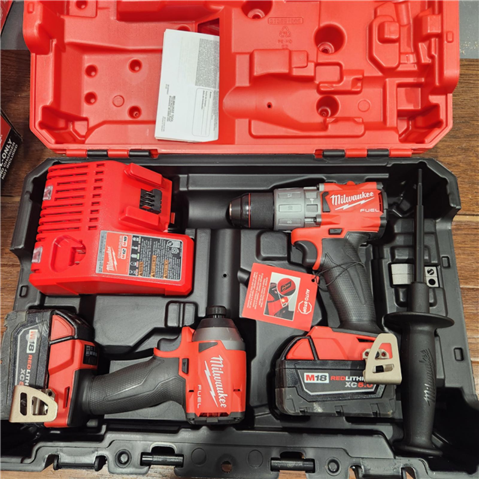 AS-IS M18 FUEL 18V Lithium-Ion Brushless Cordless Hammer Drill and Impact Driver Combo Kit (2-Tool) with 2 Batteries