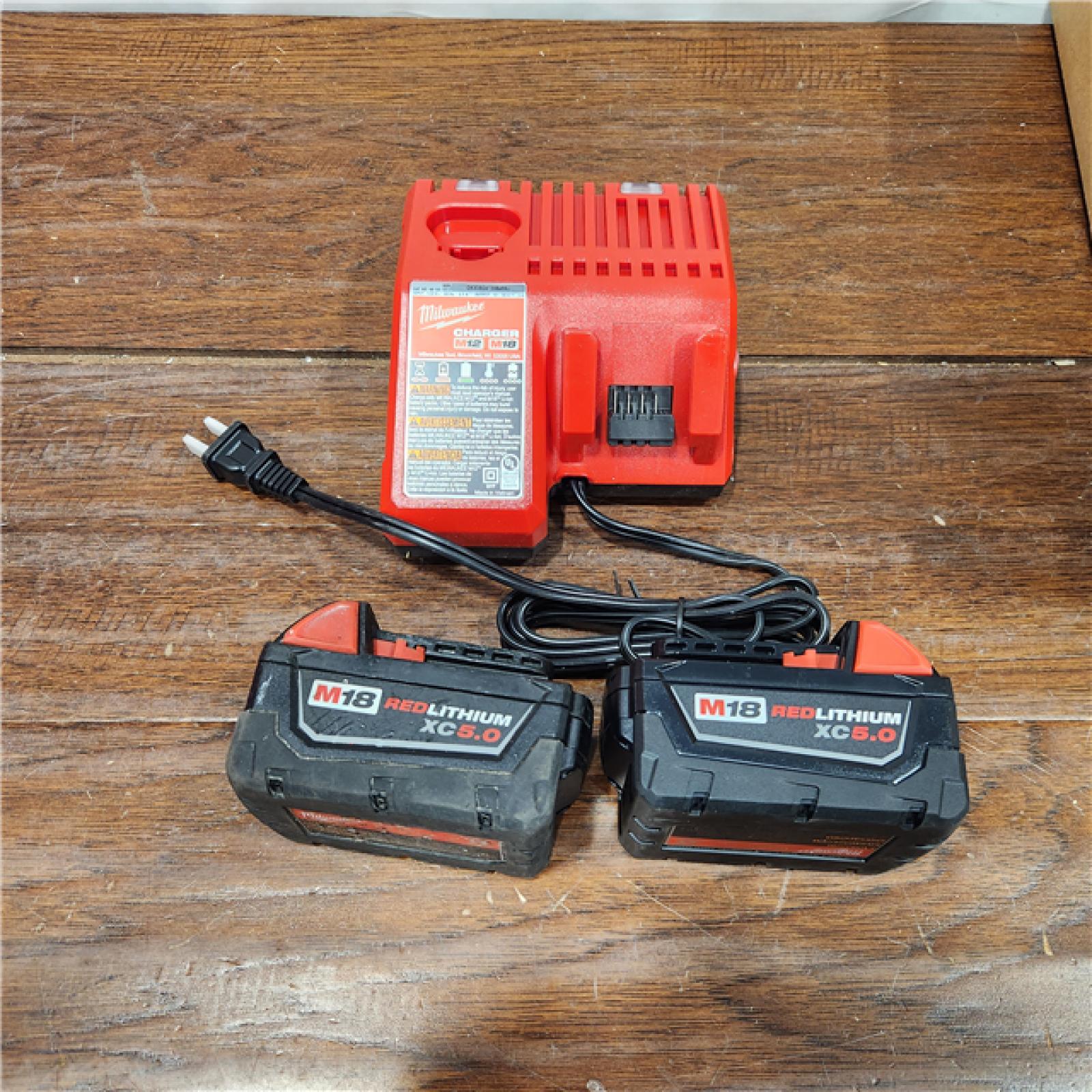 AS-IS Milwaukee M18 18-Volt Lithium-Ion XC Starter Kit with Two 5.0Ah Batteries / Charger (48-59-1852B) (2PACK)