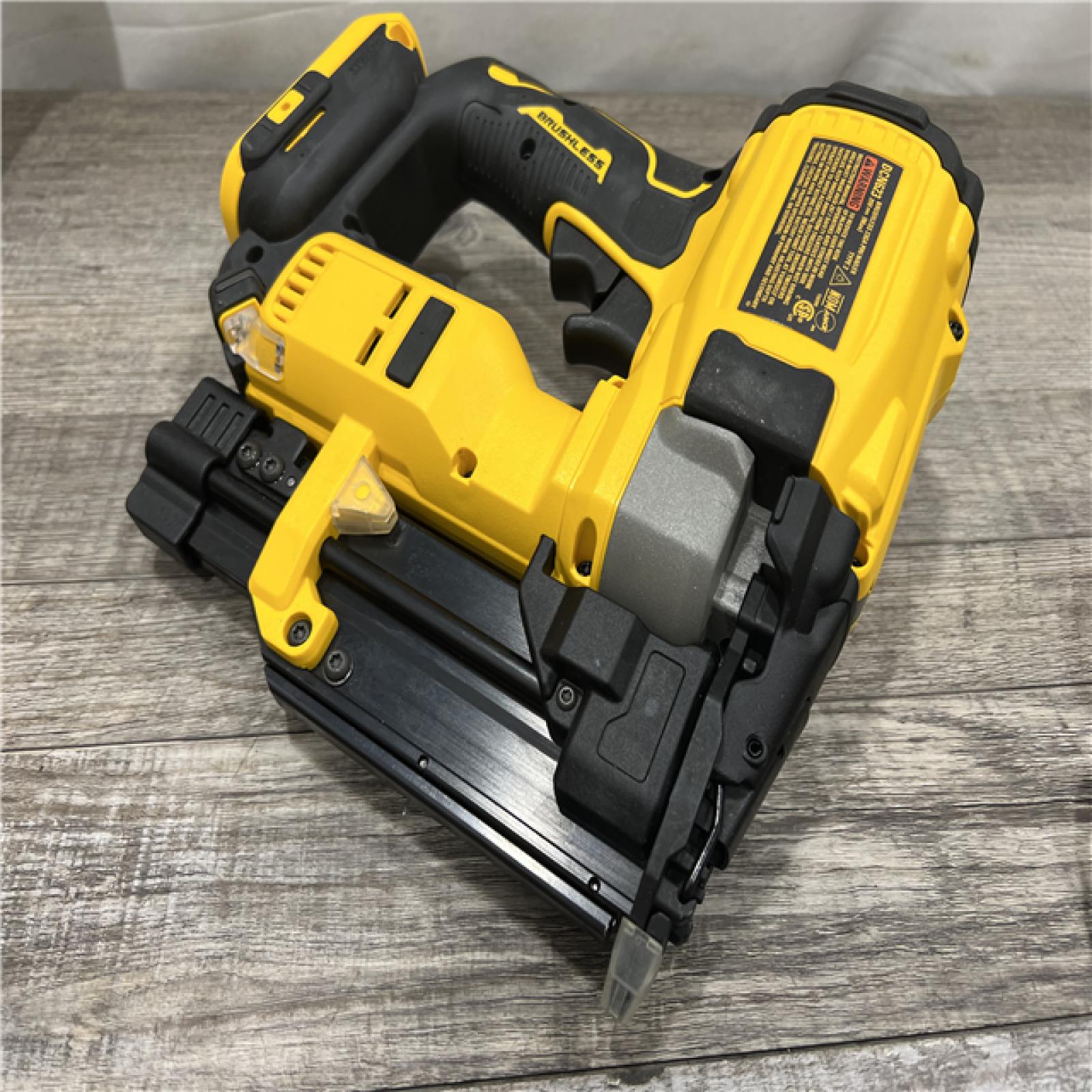 AS-IS DEWALT ATOMIC 20V MAX Lithium Ion Cordless 23 Gauge Pin Nailer Kit with 2.0Ah Battery and Charger