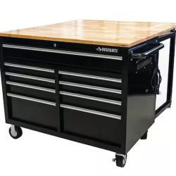 DALLAS LOCATION - Husky Tool Storage 46 in. W x 51 in. D Standard Duty Black Mobile Workbench Cabinet with Solid Top Full Length Extension Table