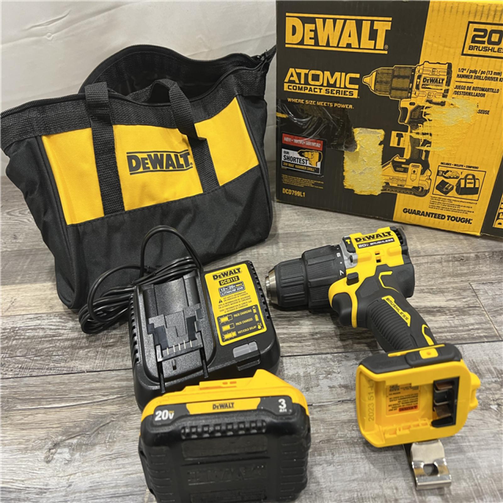 AS-IS DEWALT ATOMIC 20-Volt Lithium-Ion Cordless 1/2 in. Compact Hammer Drill with 3.0Ah Battery, Charger and Bag