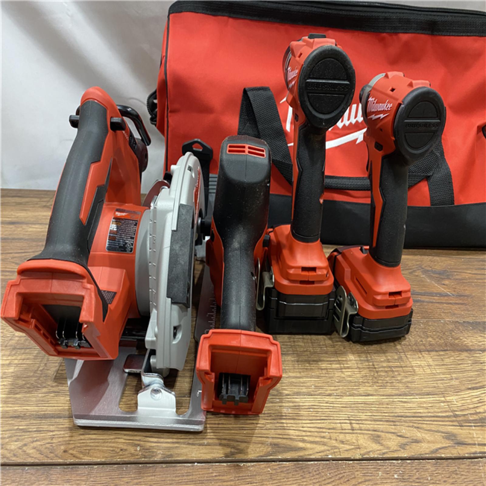 AS IS Milwaukee M18 18-Volt Lithium-Ion Brushless Cordless Combo Kit (4-Tool) with 2-Batteries, 1-Charger and Tool Bag