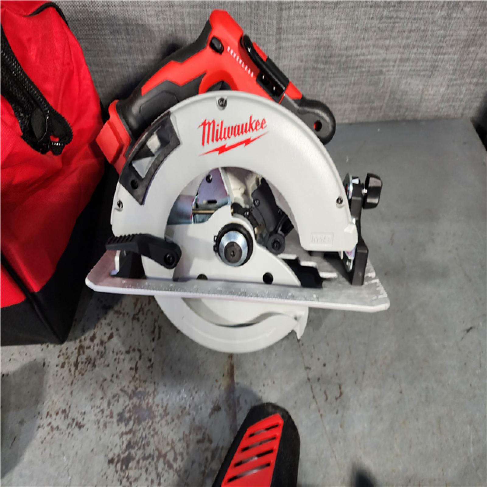 HOUSTON LOCATION - AS-IS (APPEARS LIKE NEW) Milwaukee M18 18-Volt Lithium-Ion Brushless Cordless Combo Kit (4-Tool) with 2-Batteries, 1-Charger and Tool Bag