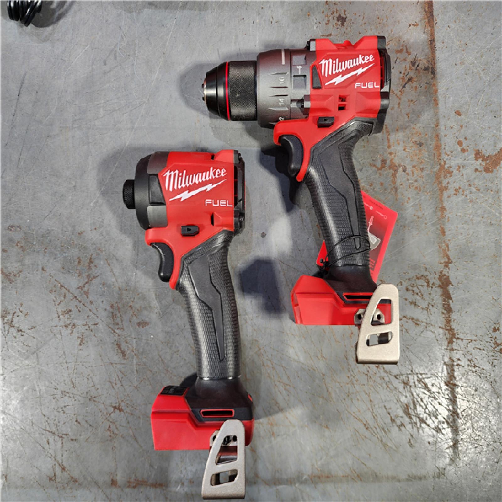 HOUSTON LOCATION - AS-IS (APPEARS LIKE NEW) Milwaukee M18 FUEL 18V Lithium-Ion Brushless Cordless Hammer Drill and Impact Driver Combo Kit (2-Tool) with 2 Batteries