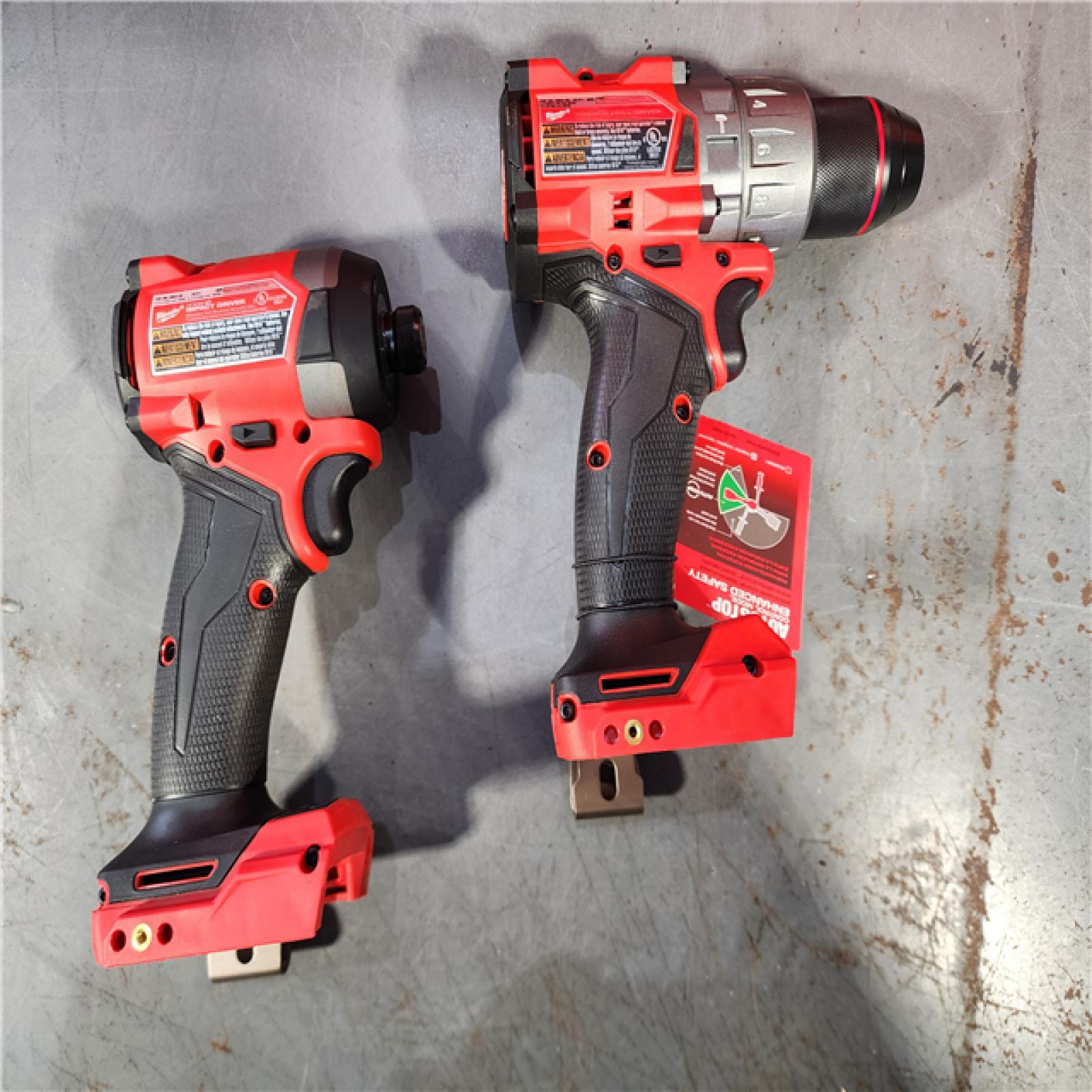 HOUSTON LOCATION - AS-IS (APPEARS LIKE NEW) Milwaukee M18 FUEL 18V Lithium-Ion Brushless Cordless Hammer Drill and Impact Driver Combo Kit (2-Tool) with 2 Batteries