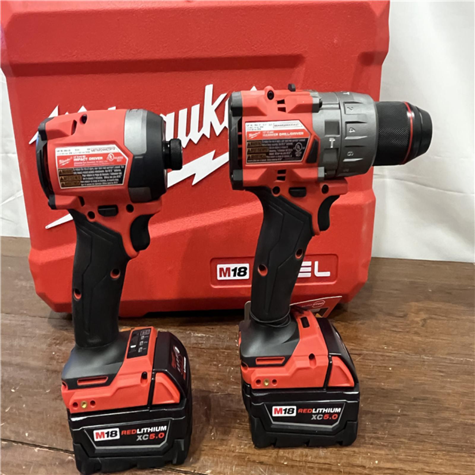 AS-ISMilwaukee M18 FUEL 18V Lithium-Ion Brushless Cordless Hammer Drill and Impact Driver Combo Kit (2-Tool) with 2 Batteries