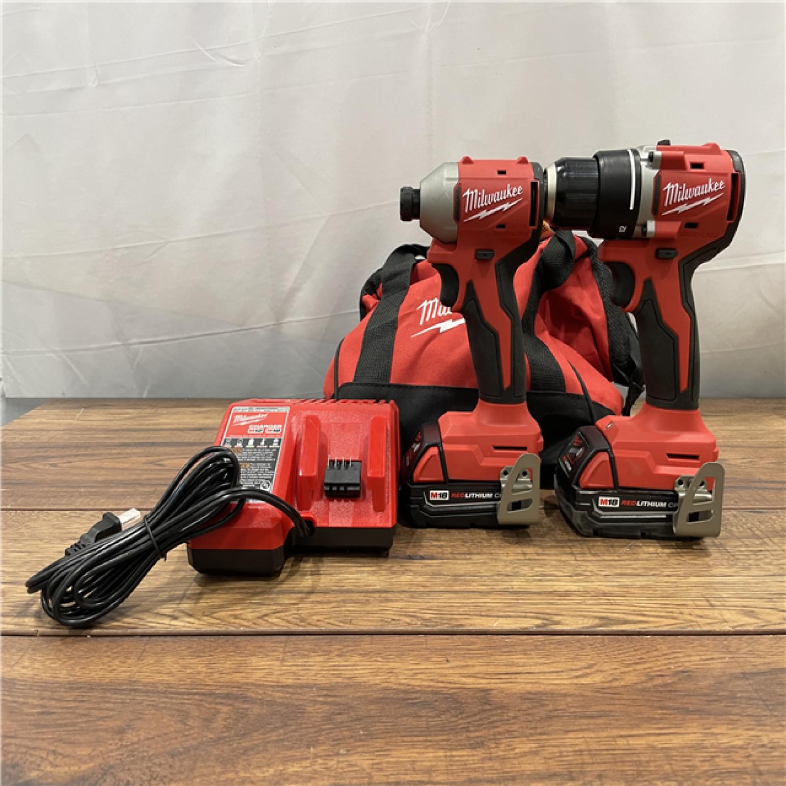 AS-IS Milwaukee M18 18V Lithium-Ion Brushless Cordless Compact Drill/Impact Combo Kit (2-Tool)