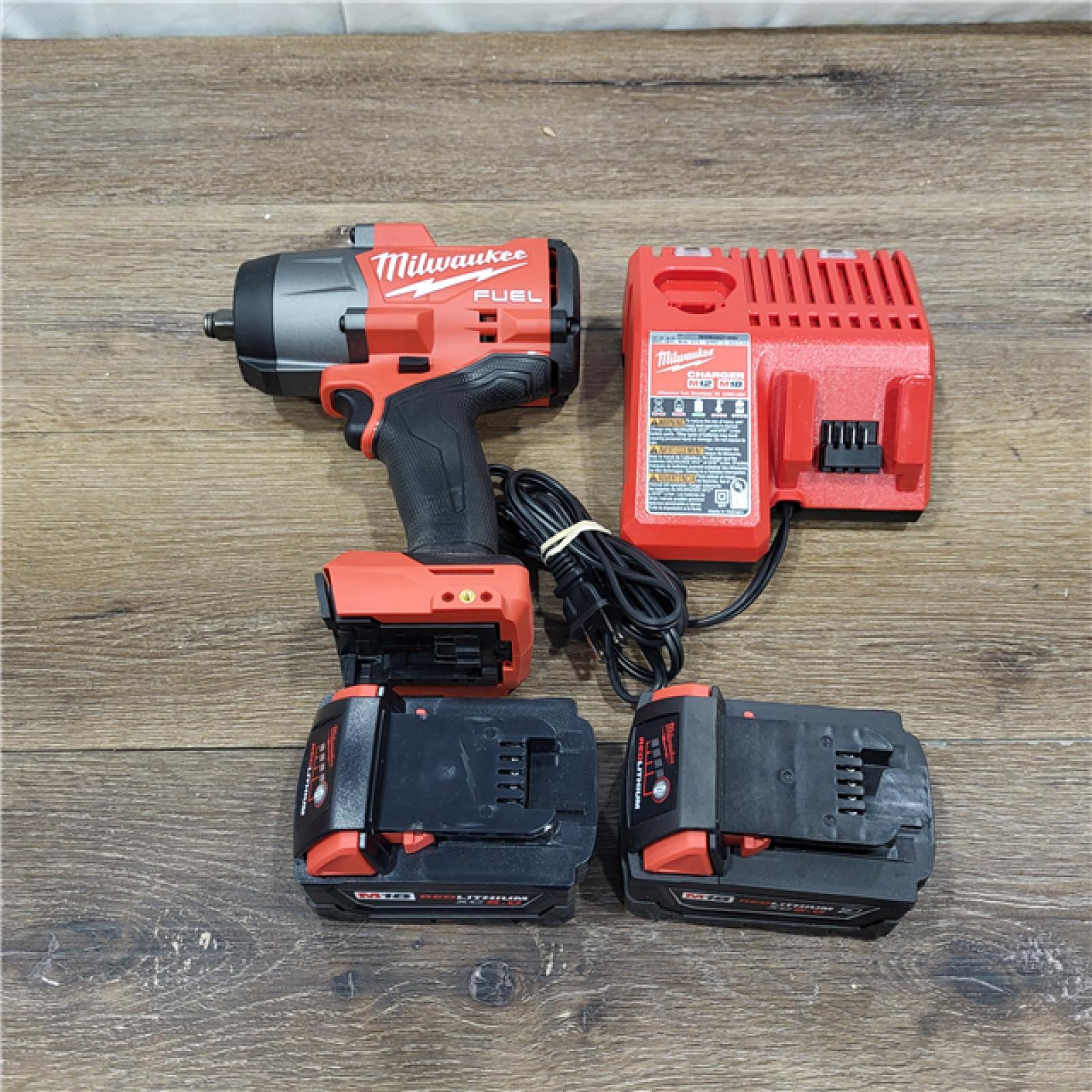 AS-IS Milwaukee M18 FUEL Brushless Cordless High-Torque 1/2 in. Impact Wrench W/Friction Ring Kit