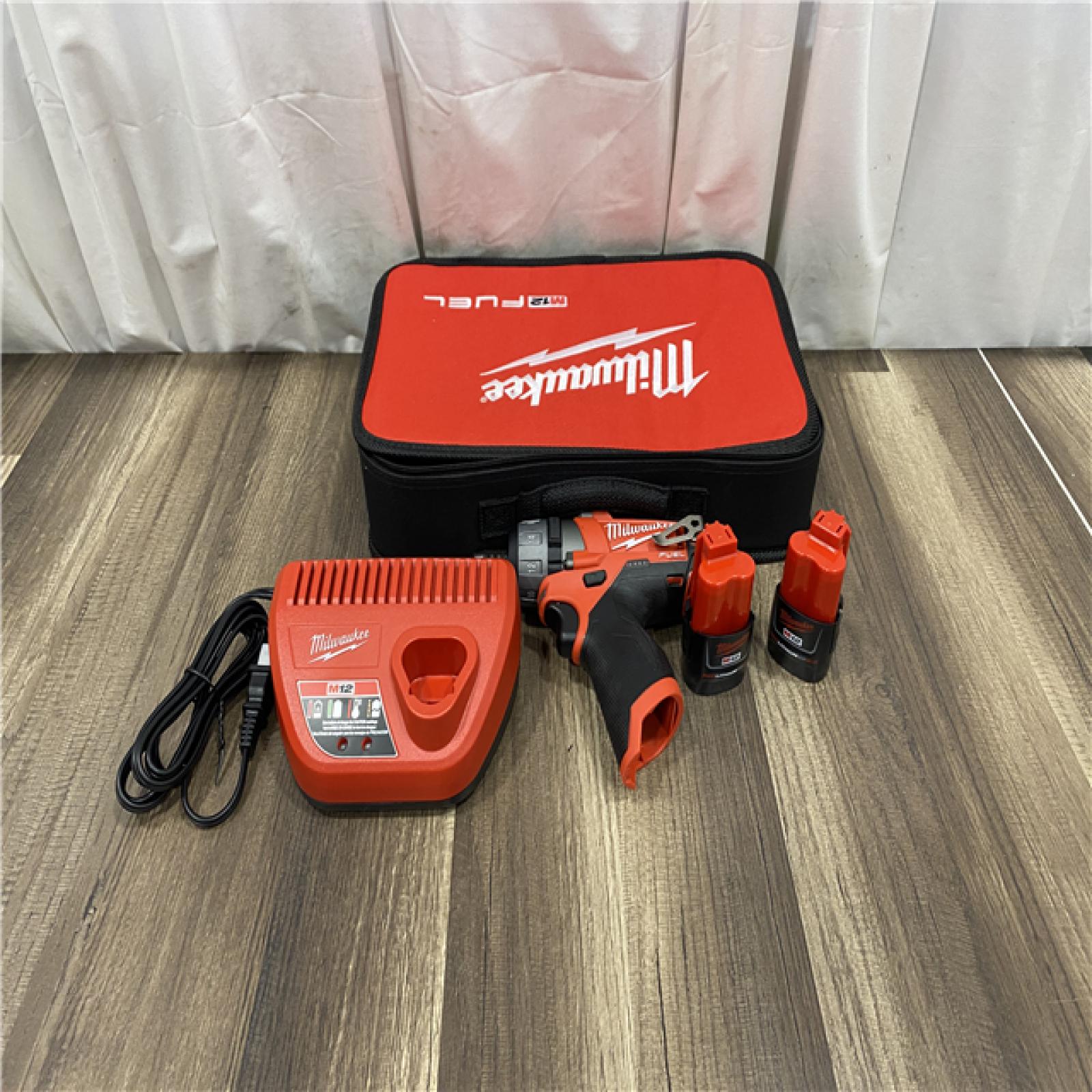 AS IS Milwaukee M12 FUEL 12-Volt Lithium-Ion Brushless Cordless 1/4 in. Hex 2-Speed Screwdriver Kit W/(2) 2.0h Batteries & Hard Case