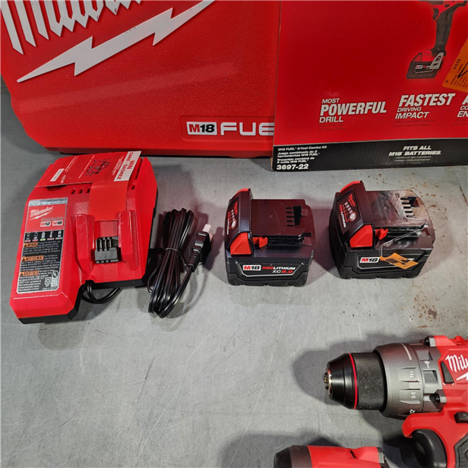 HOUSTON LOCATION - AS-IS (APPEARS LIKE NEW) Milwaukee M18 FUEL 18V Lithium-Ion Brushless Cordless Hammer Drill and Impact Driver Combo Kit (2-Tool) with 2 Batteries