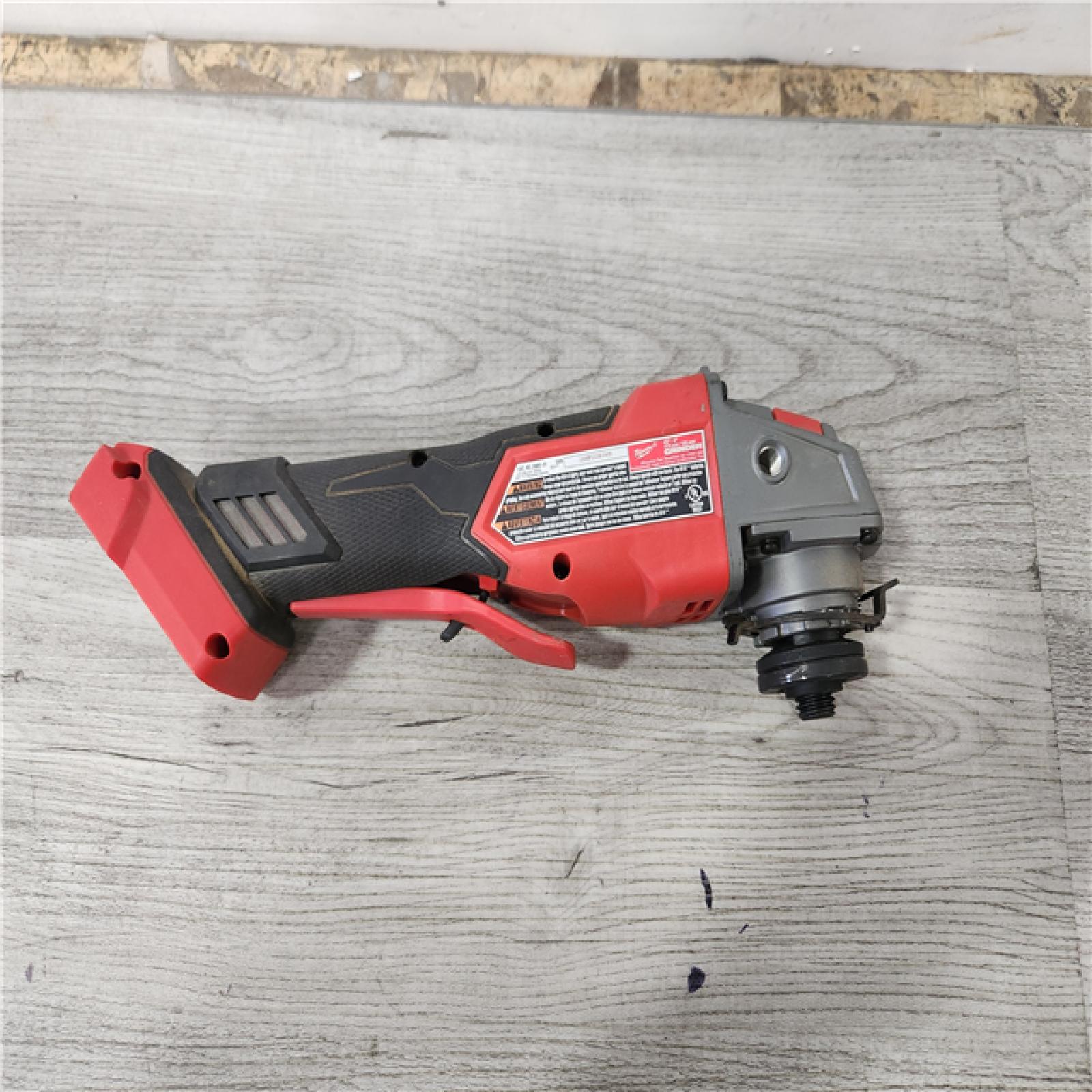 Phoenix Location Milwaukee M18 FUEL 18V Lithium-Ion Brushless Cordless 4-1/2 in./5 in. Grinder w/Paddle Switch (Tool-Only)