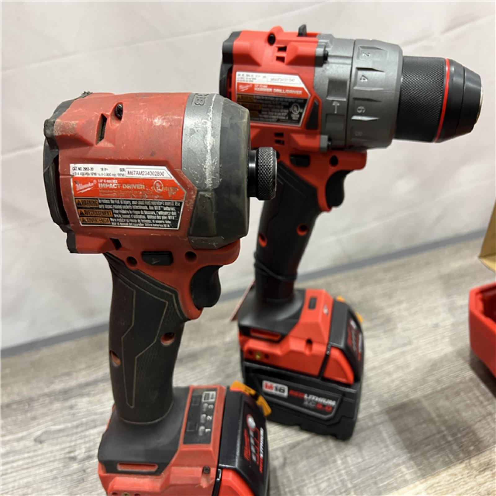 AS-IS Milwaukee M18 FUEL 18V Lithium-Ion Brushless Cordless Hammer Drill and Impact Driver Combo Kit (2-Tool) with 2 Batteries