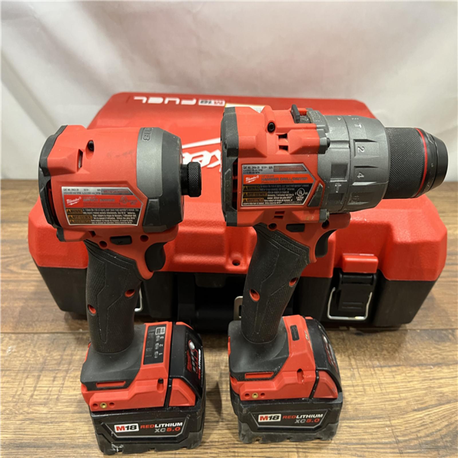 AS IS Milwaukee M18 FUEL 18V Lithium-Ion Brushless Cordless Hammer Drill and Impact Driver Combo Kit (2-Tool) with 2 Batteries