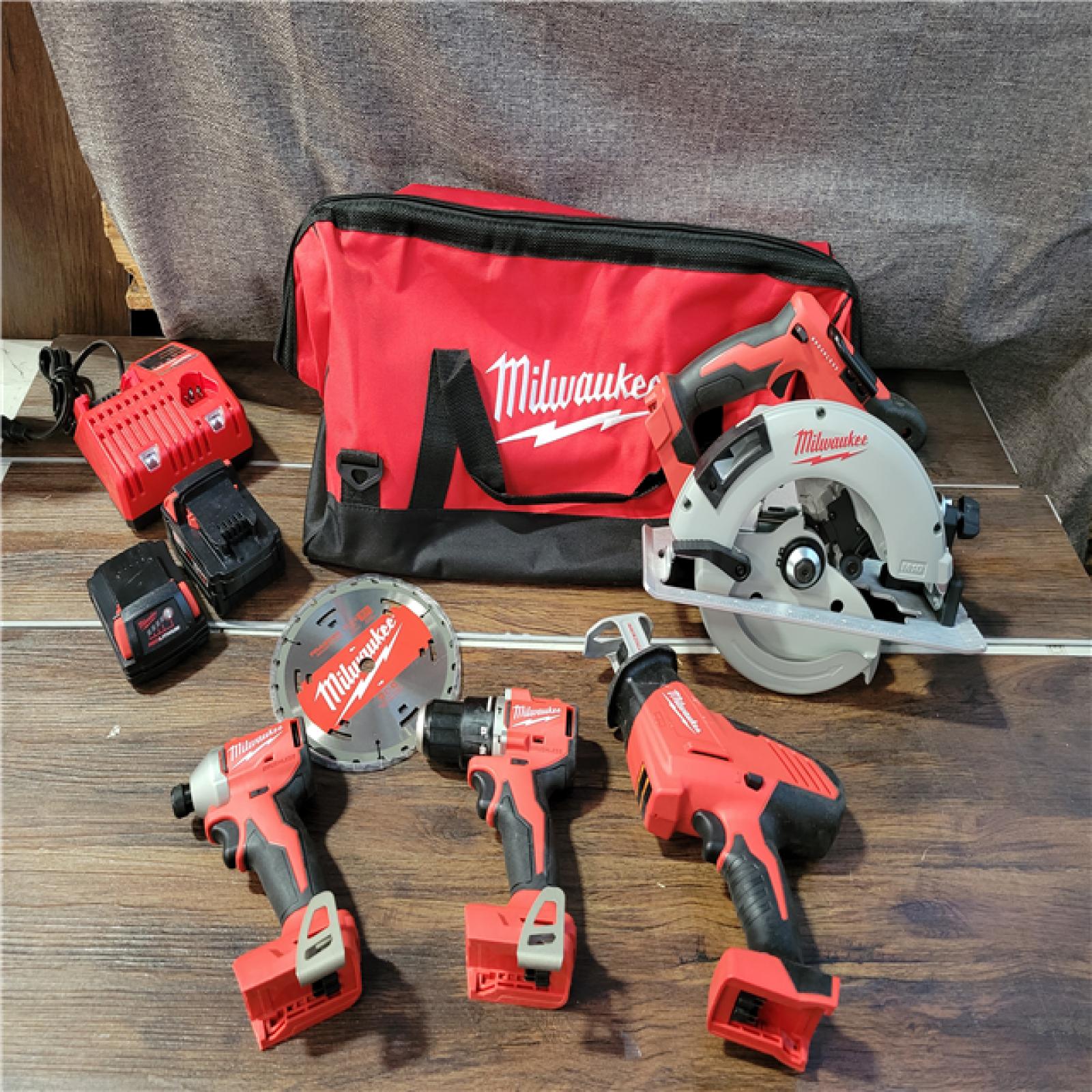 CALIFORNIA NEW MILWAUKEE M18 4-TOOL COMBO KIT (2 BATTERIES, 1 CHARGER, AND BAG INCLUDED)