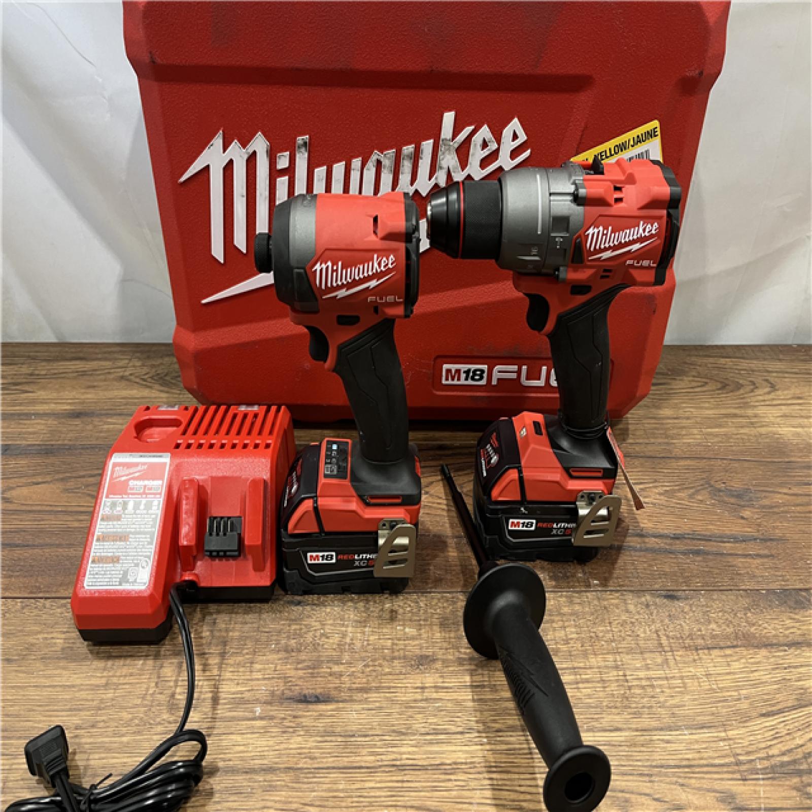 AS IS Milwaukee M18 FUEL 18V Lithium-Ion Brushless Cordless Hammer Drill and Impact Driver Combo Kit (2-Tool) with 2 Batteries