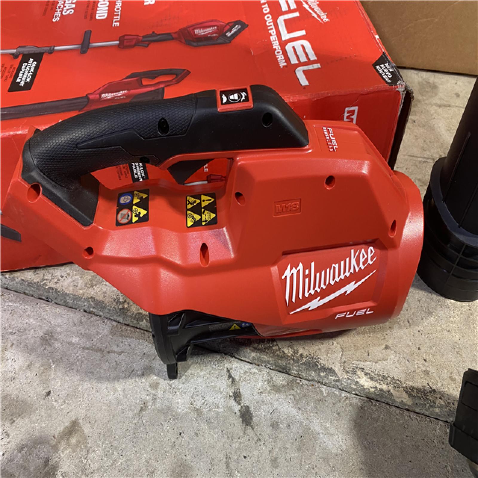 HOUSTON LOCATION -AS-IS Milwaukee 3000-21 M18 FUEL Brushless Lithium-Ion Cordless String Trimmer with QUIK-LOK / Blower Combo Kit (8 Ah) (NO BATTERY AND CHARGER))